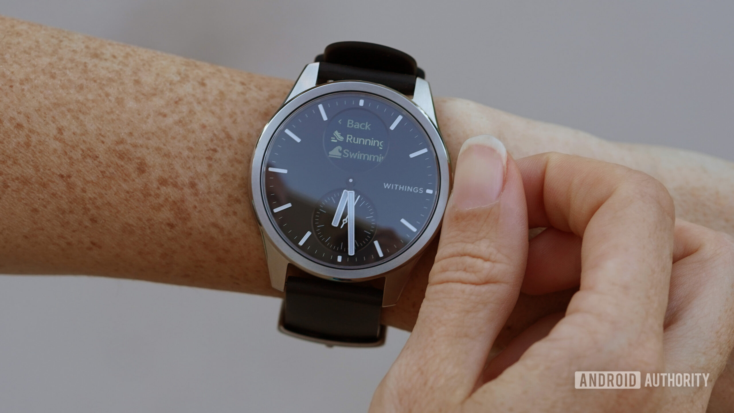 A user reviews the workout options on their Withings ScanWatch 2.