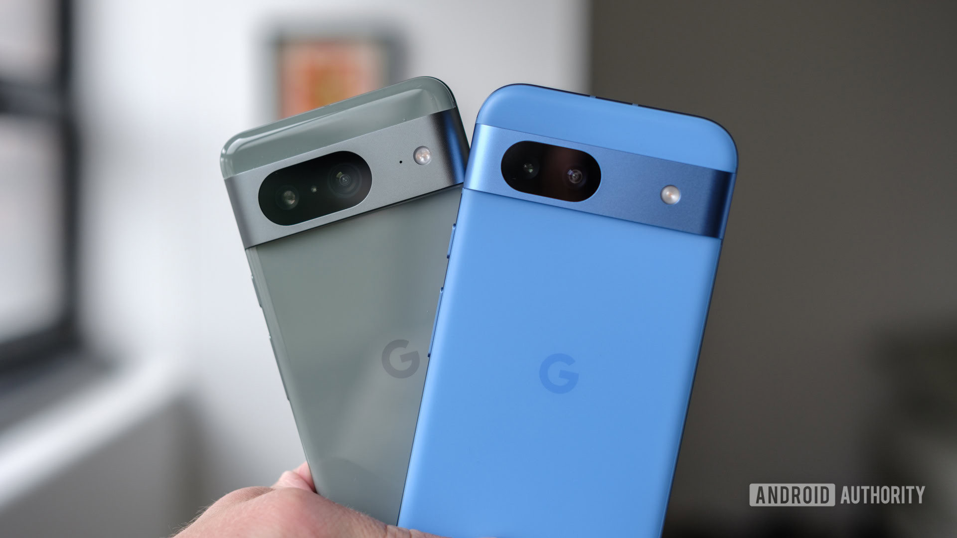 Google Pixel 8 vs Google Pixel 8a cameras in hand