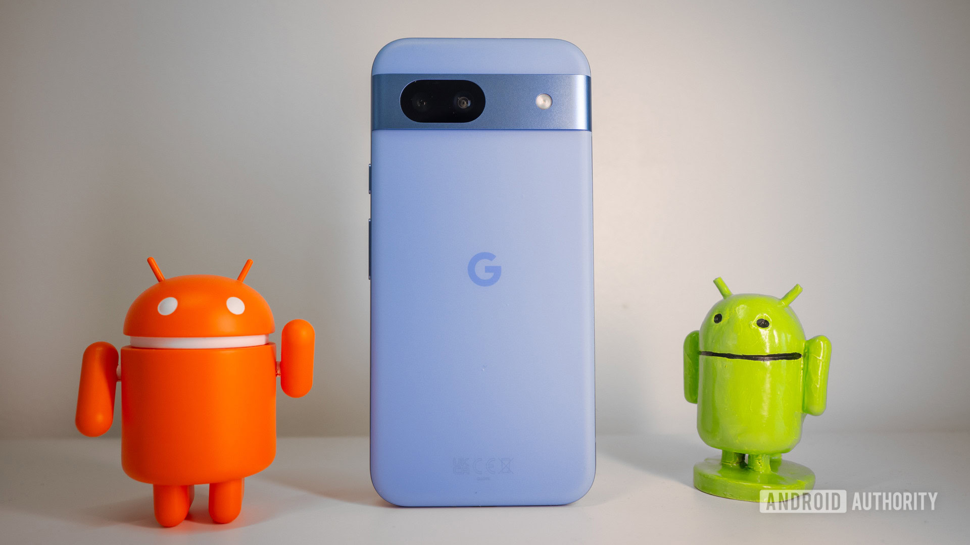 Pixel 8a standing android figures