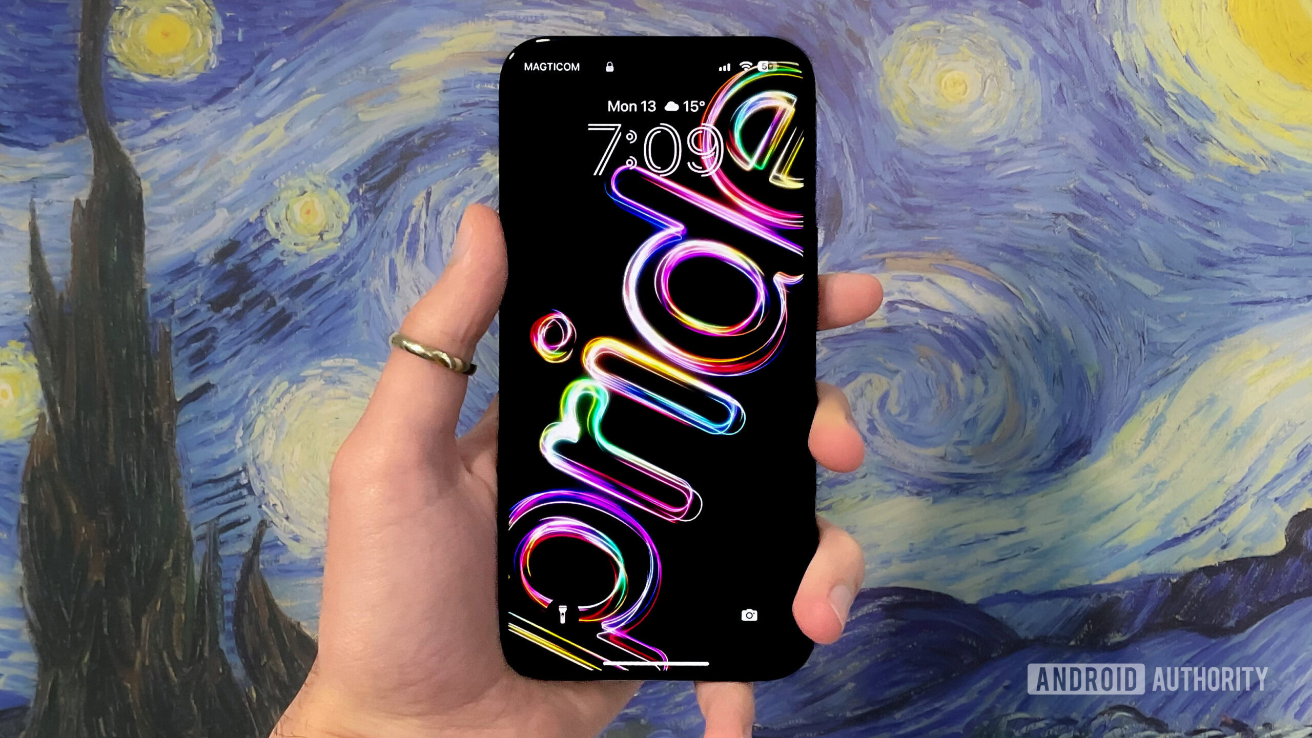 iPhone 15 Pro Max with LGBTQ+ Pride wallpaper on iOS 17.5