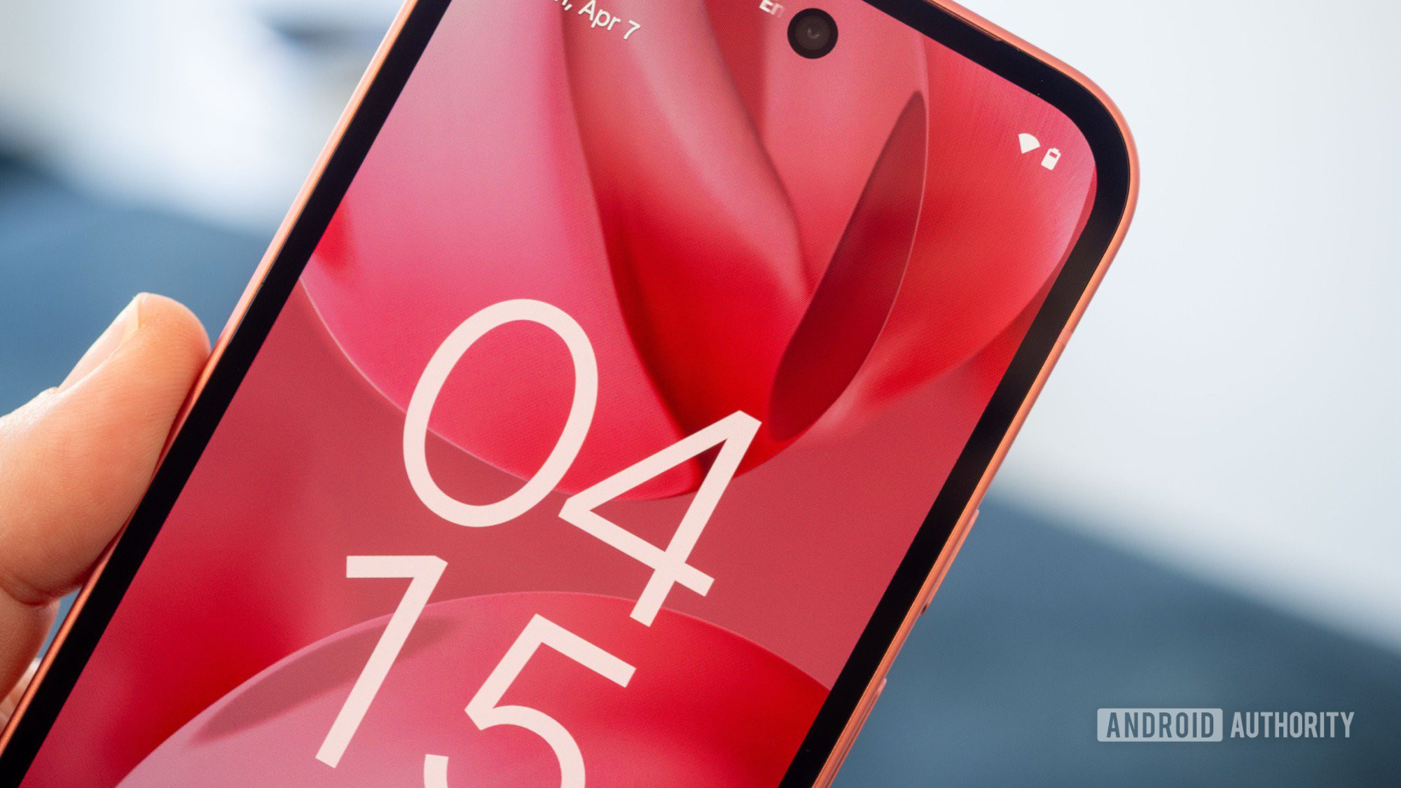 google pixel 9a in hand screensaver