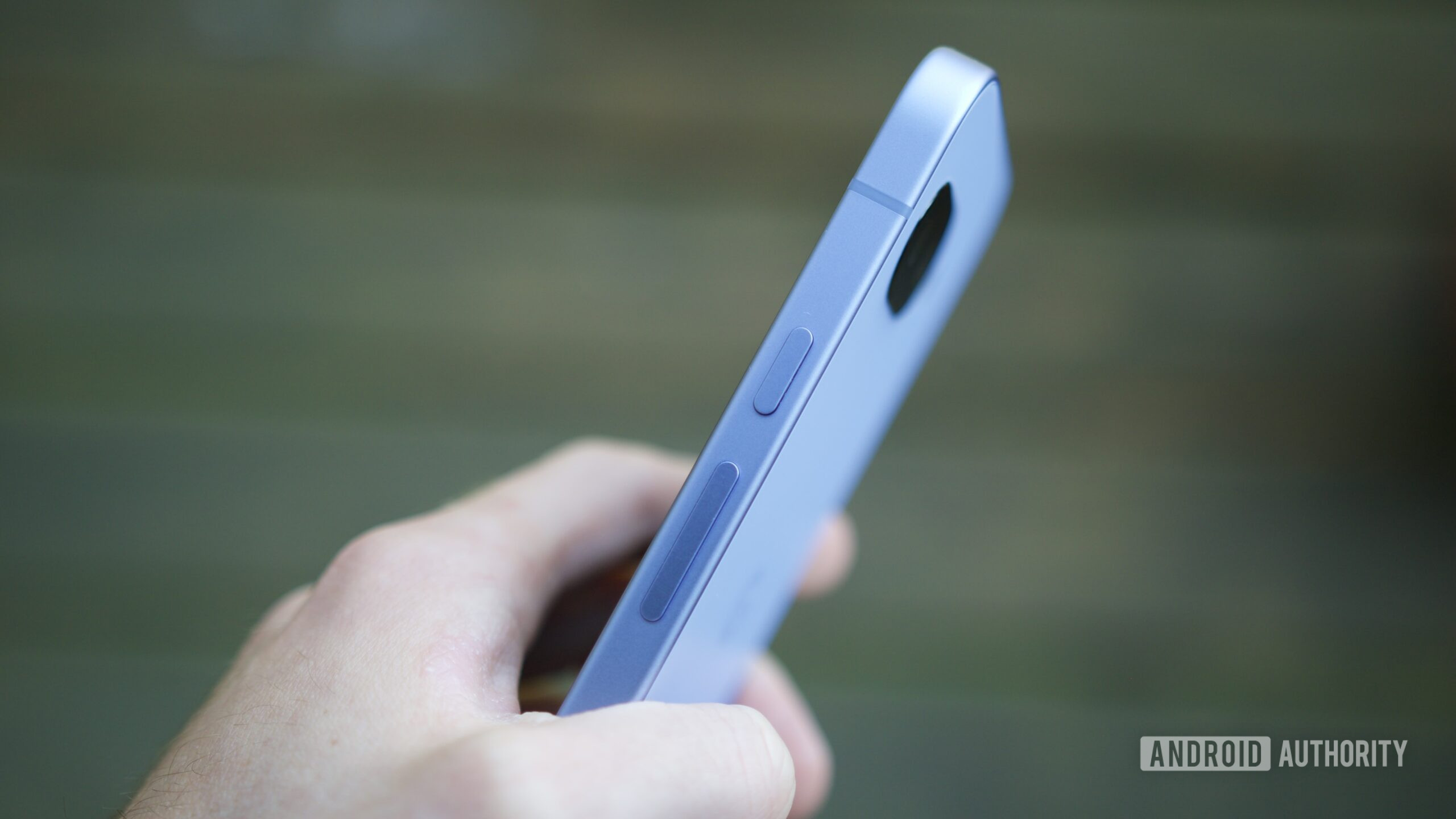 A side view of the Google Pixel 9a, showing the power button.