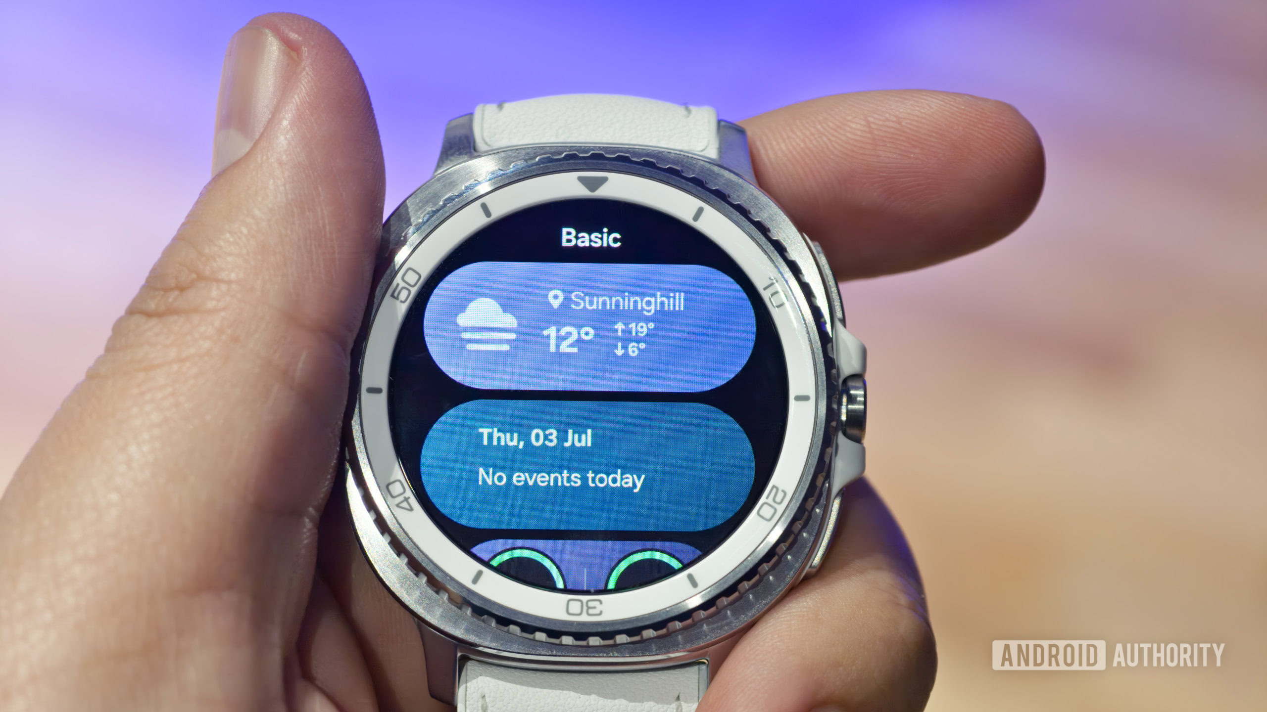 Samsung Galaxy Watch 8 Classic in hand showing weather Samsung Galaxy Watch 8 Classic in hand showing weather