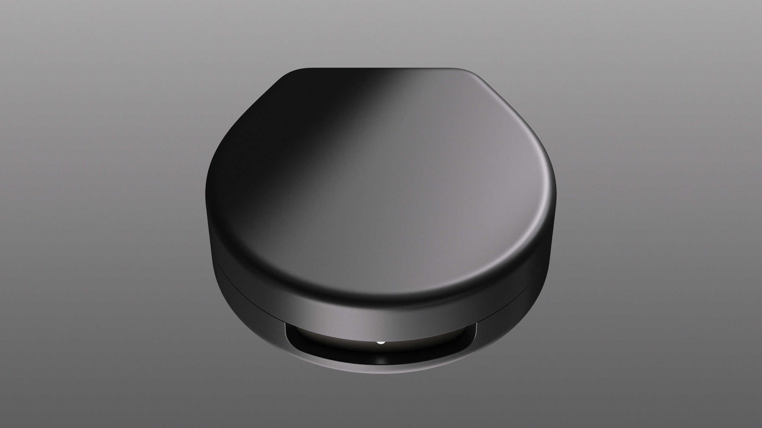 Oura Ring Charging Case Closed A. closed Oura Ring Charging Case features an LED indicator light.