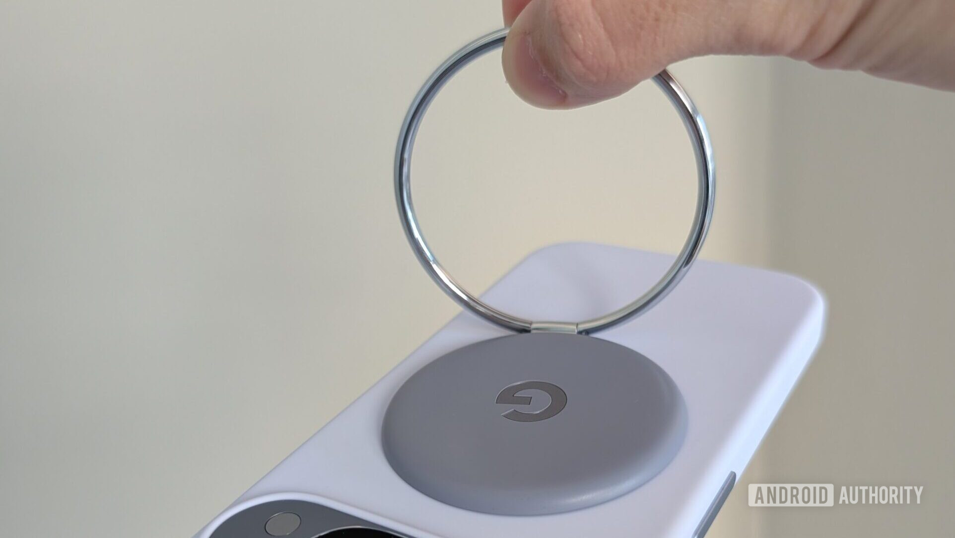 Pixelsnap Ring Stand with Pixel 10 Pro dangling