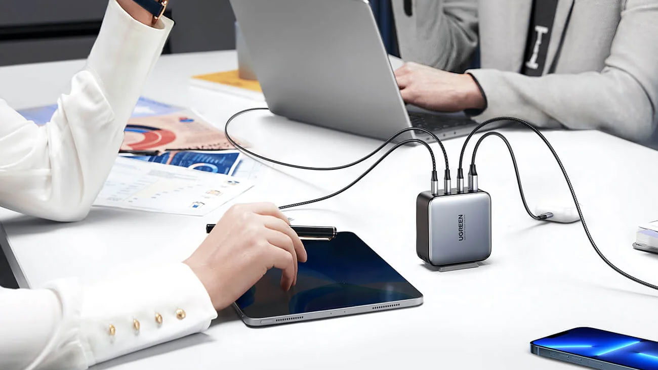 UGREEN Nexode 100W 4 Port Charger in conference