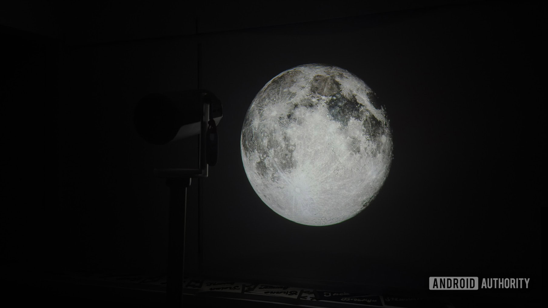 An XGIMI Mogo 4 projects an image of the moon.