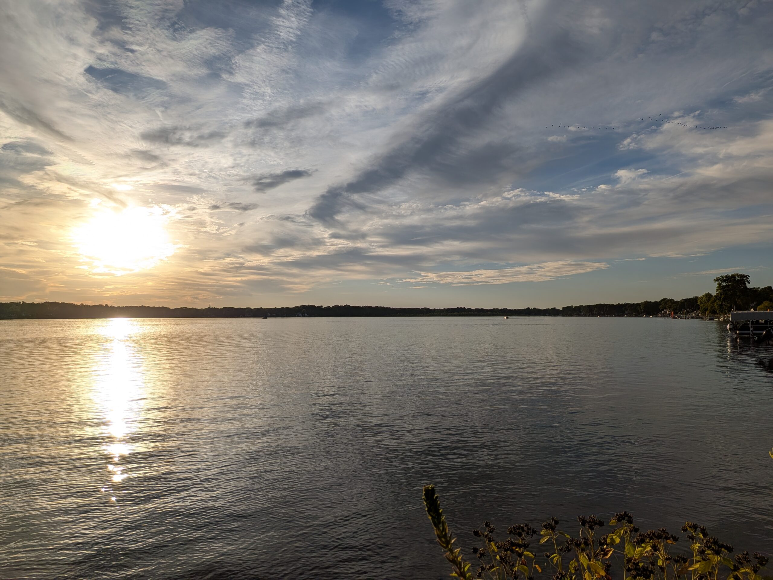 A picture of the sun over a lake, taken with the Google Pixel 10 Pro Fold.