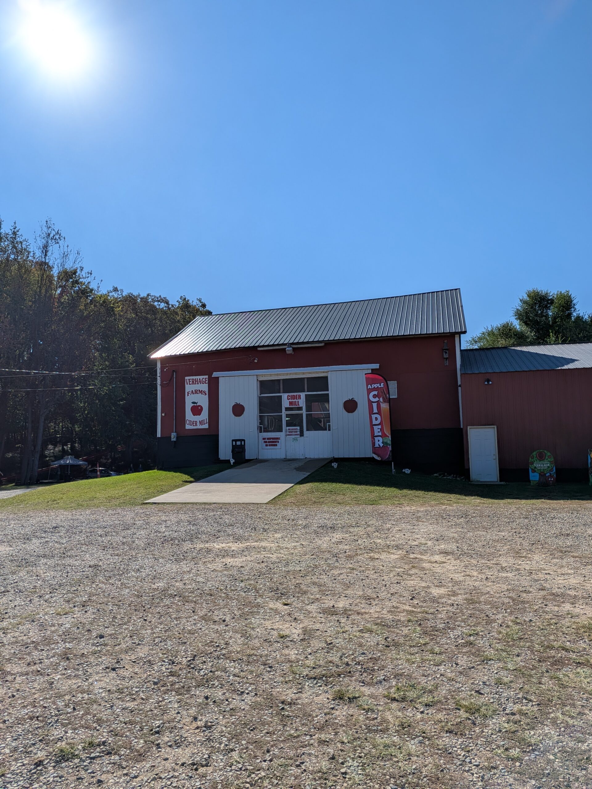 A picture of a red building on a farm, taken with the Pixel 10 Pro Fold.