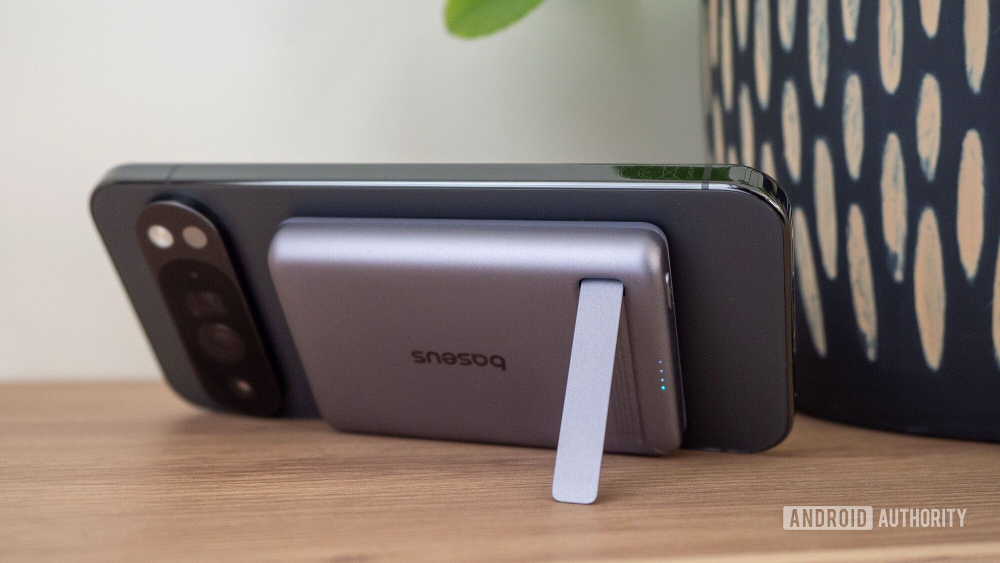 ugreen 5000mah qi2 20w power bank on phone stand