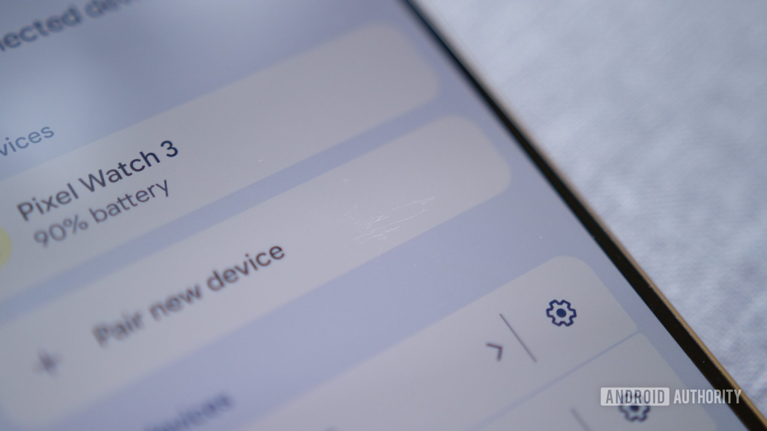 A close-up photo of a Pixel 10 Pro with scratches on its screen.