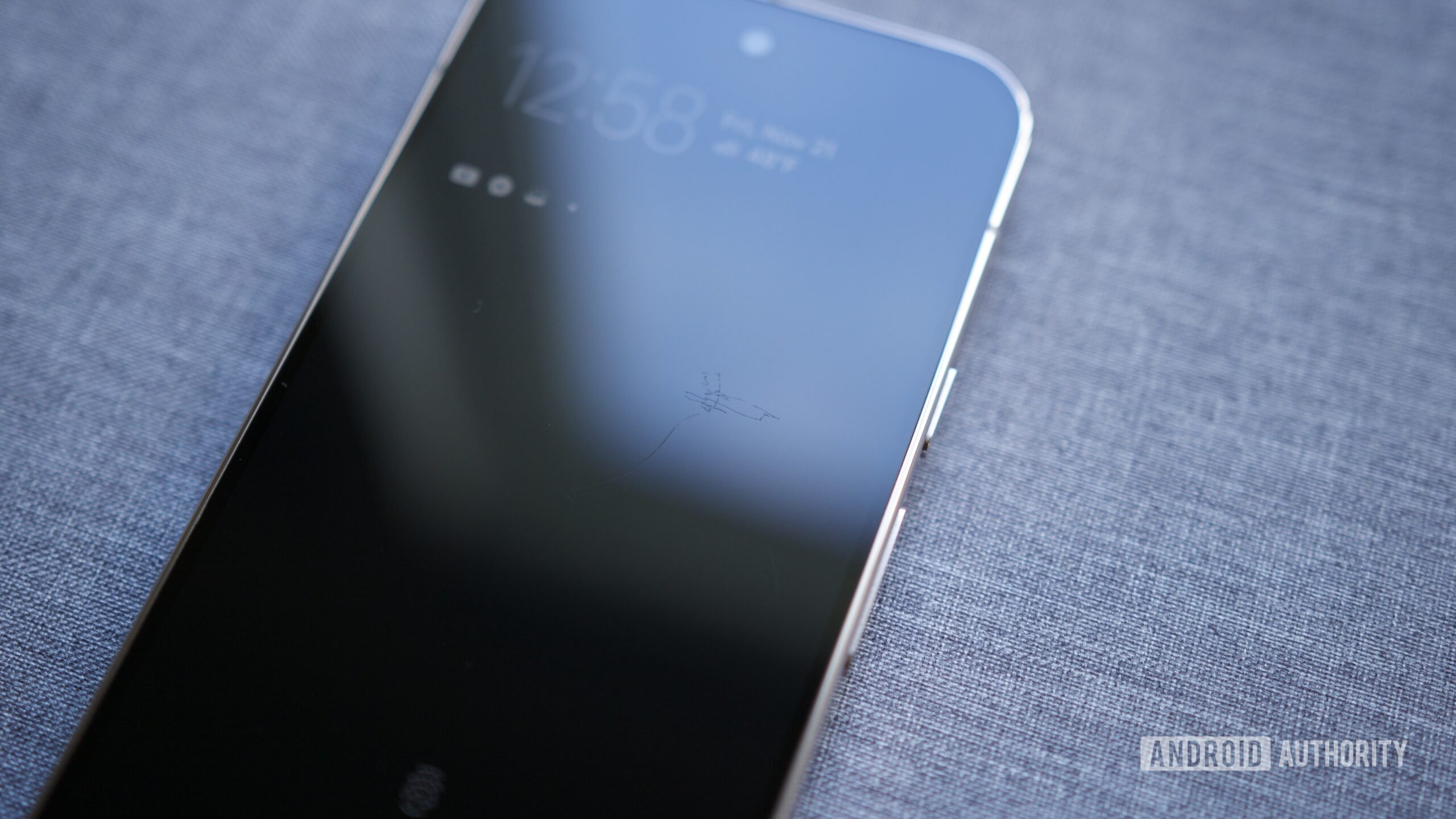 A close-up photo of a Pixel 10 Pro with scratches on its screen.