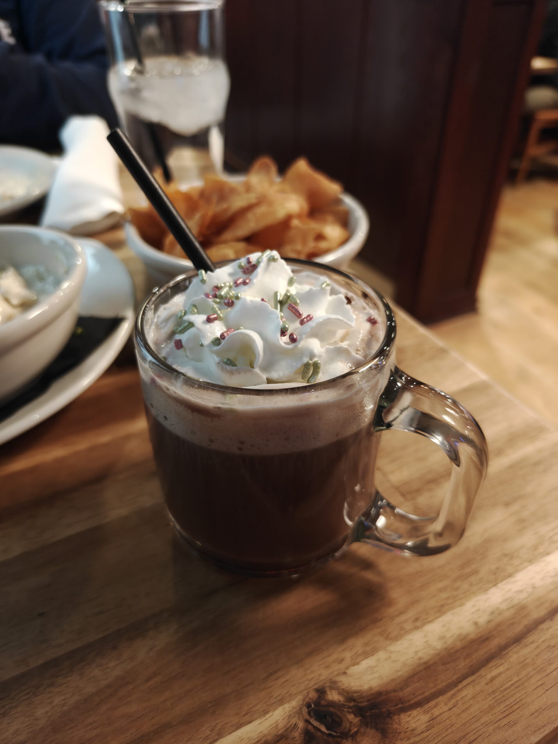 Photo of hot cocoa with whipped cream, taken with the OnePlus 15R.