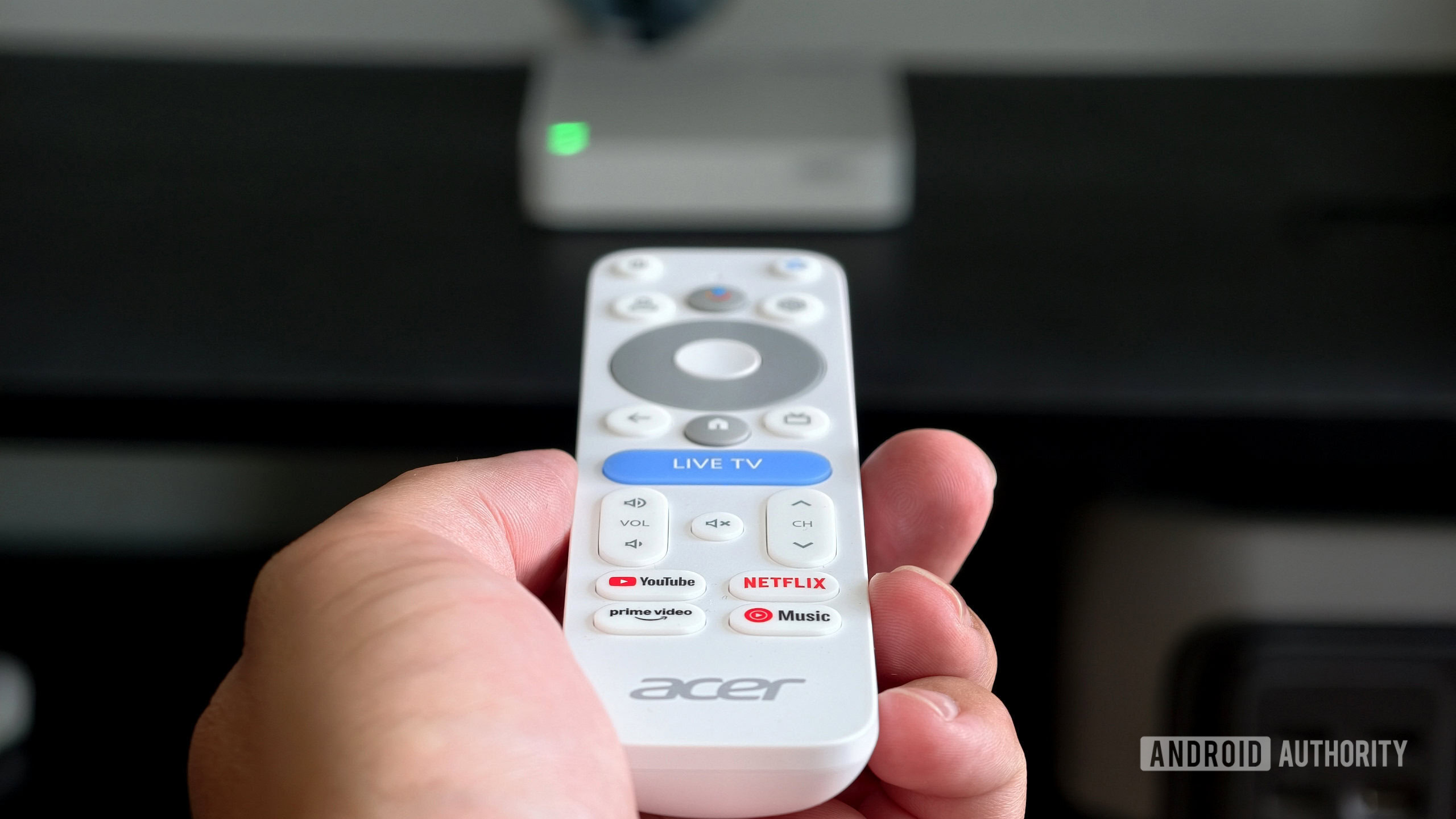 Acer 4K TV Box remote pointing at box scaled