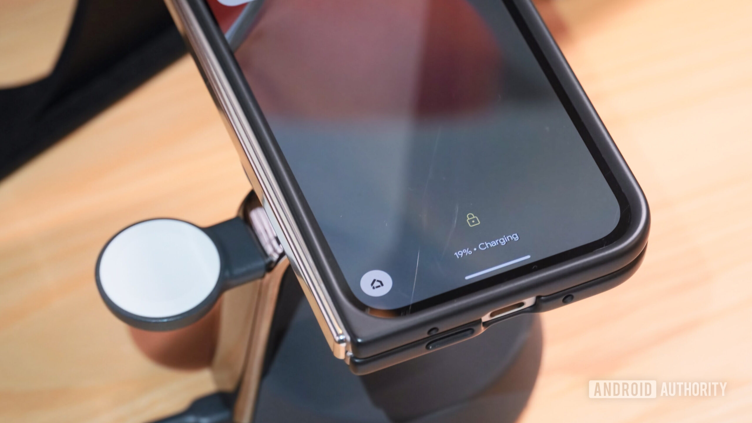 A Google Pixel 9 Pro Fold charging on a Belkin UltraCharge station.