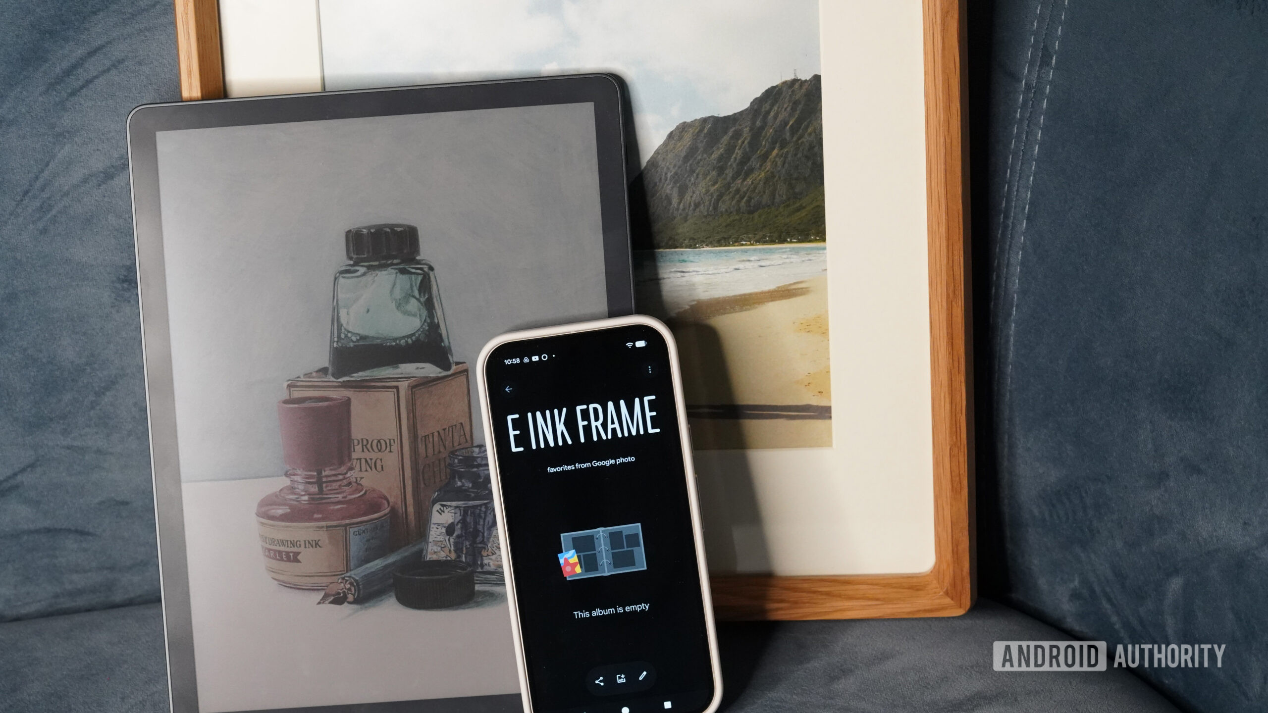 A Pixel phone displays the Google Photos app alongside an e-ink device and a photo frame.