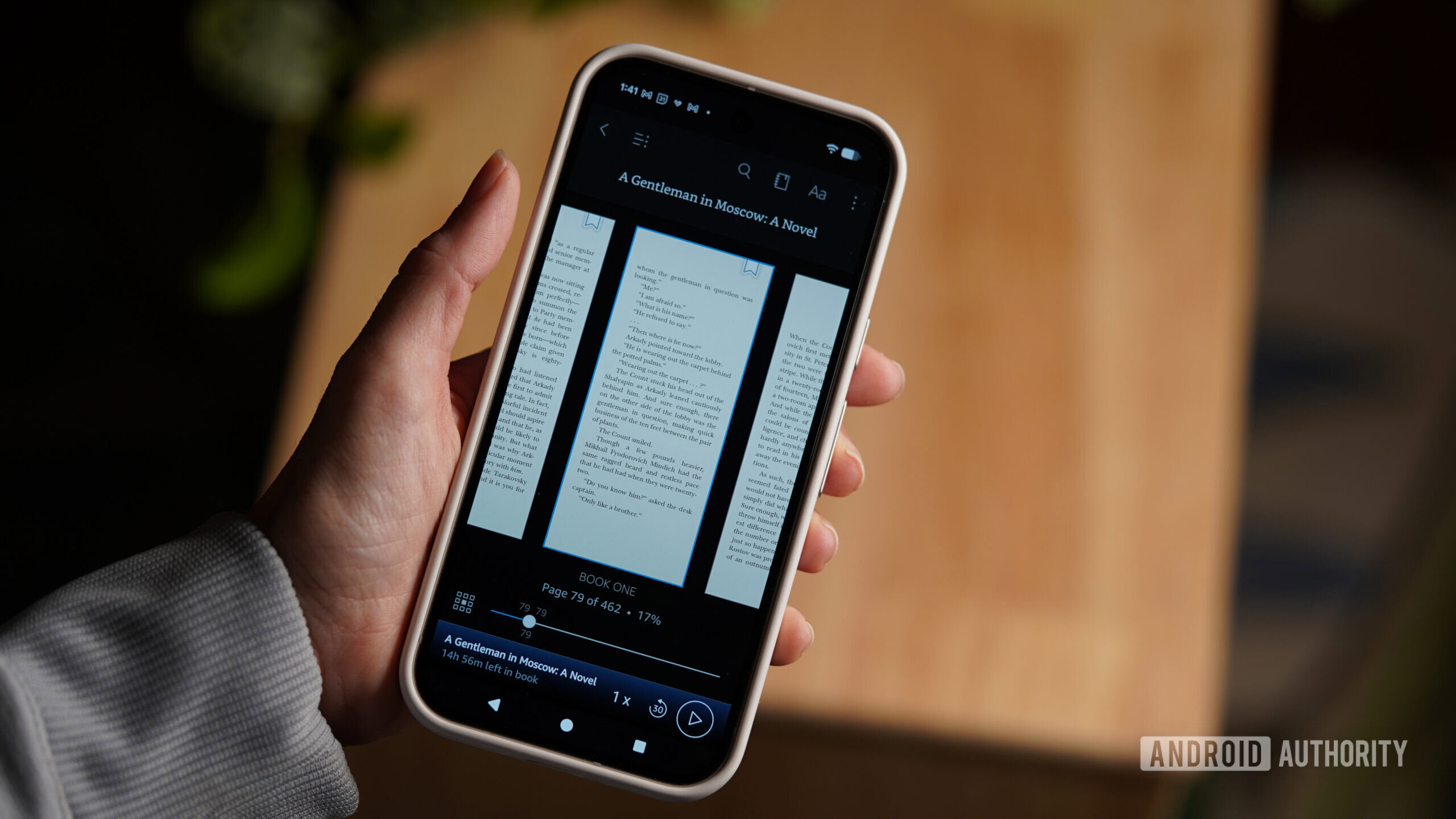 Kindle App Immersive Reading Audible A user initiates reading an ebook and listening to the synced audiobook in the Kindle App.