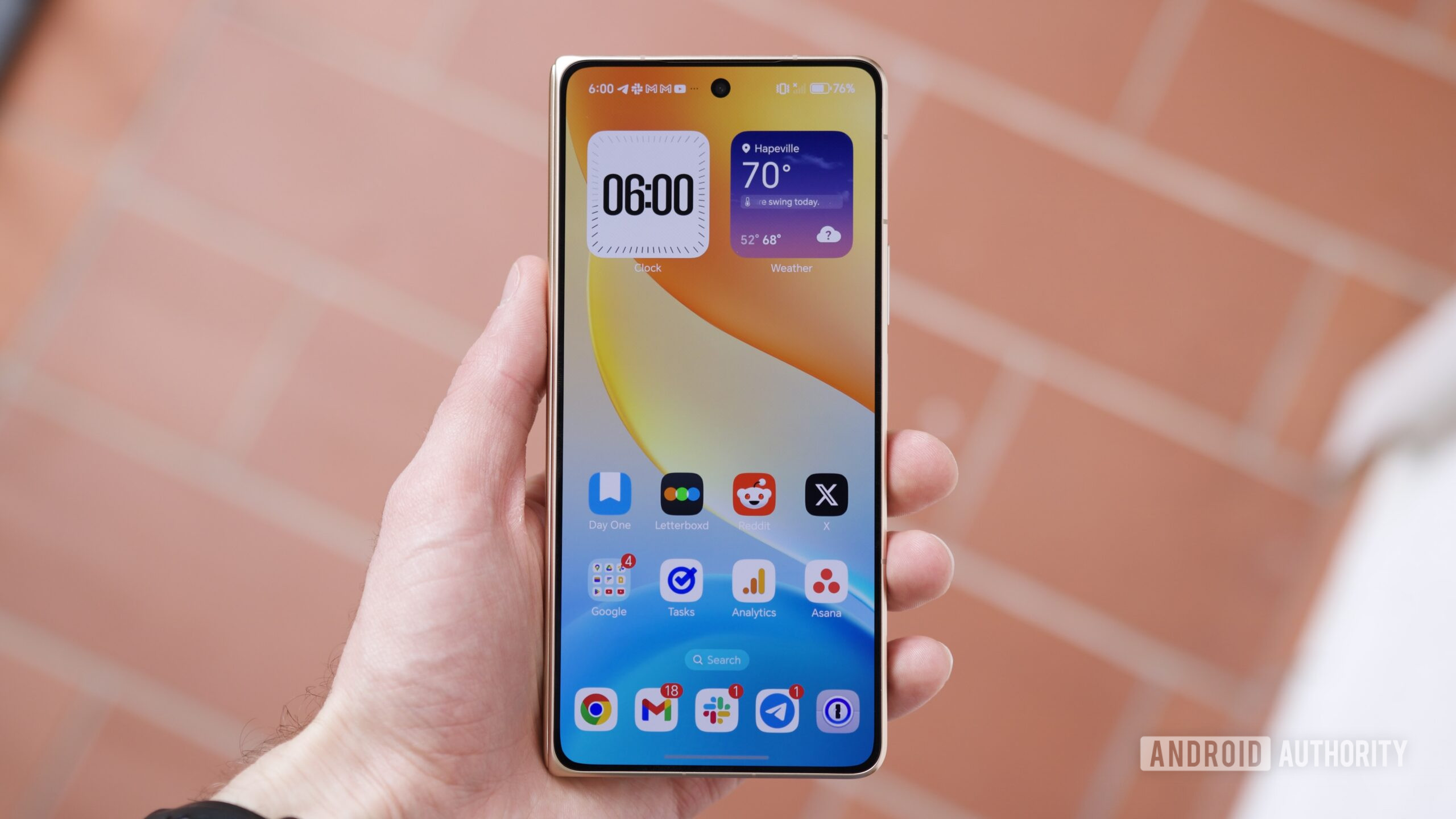 The HONOR Magic V6 with the front display on.