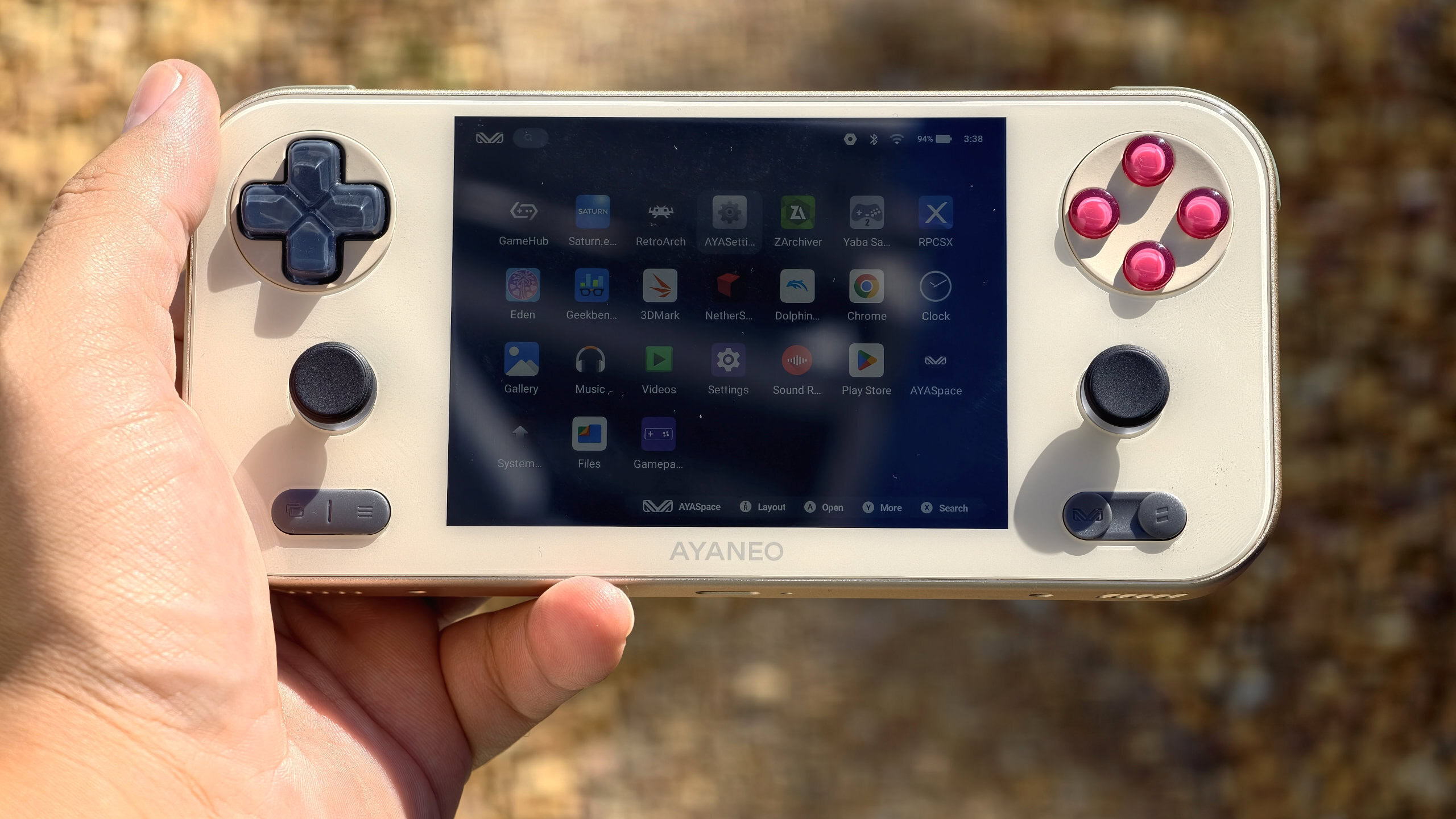 AYANEO Pocket S Mini in hand head on AYANEO Pocket S Mini in hand head on