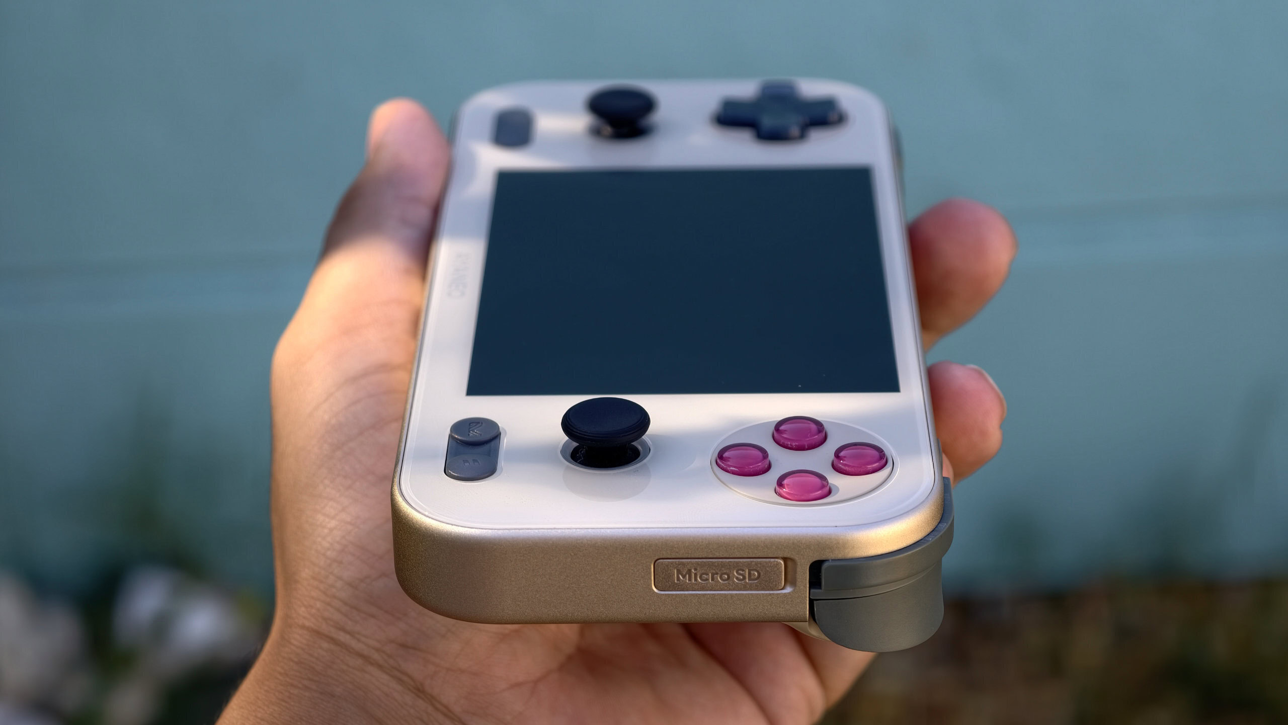 AYANEO Pocket S Mini in hand showing right edge