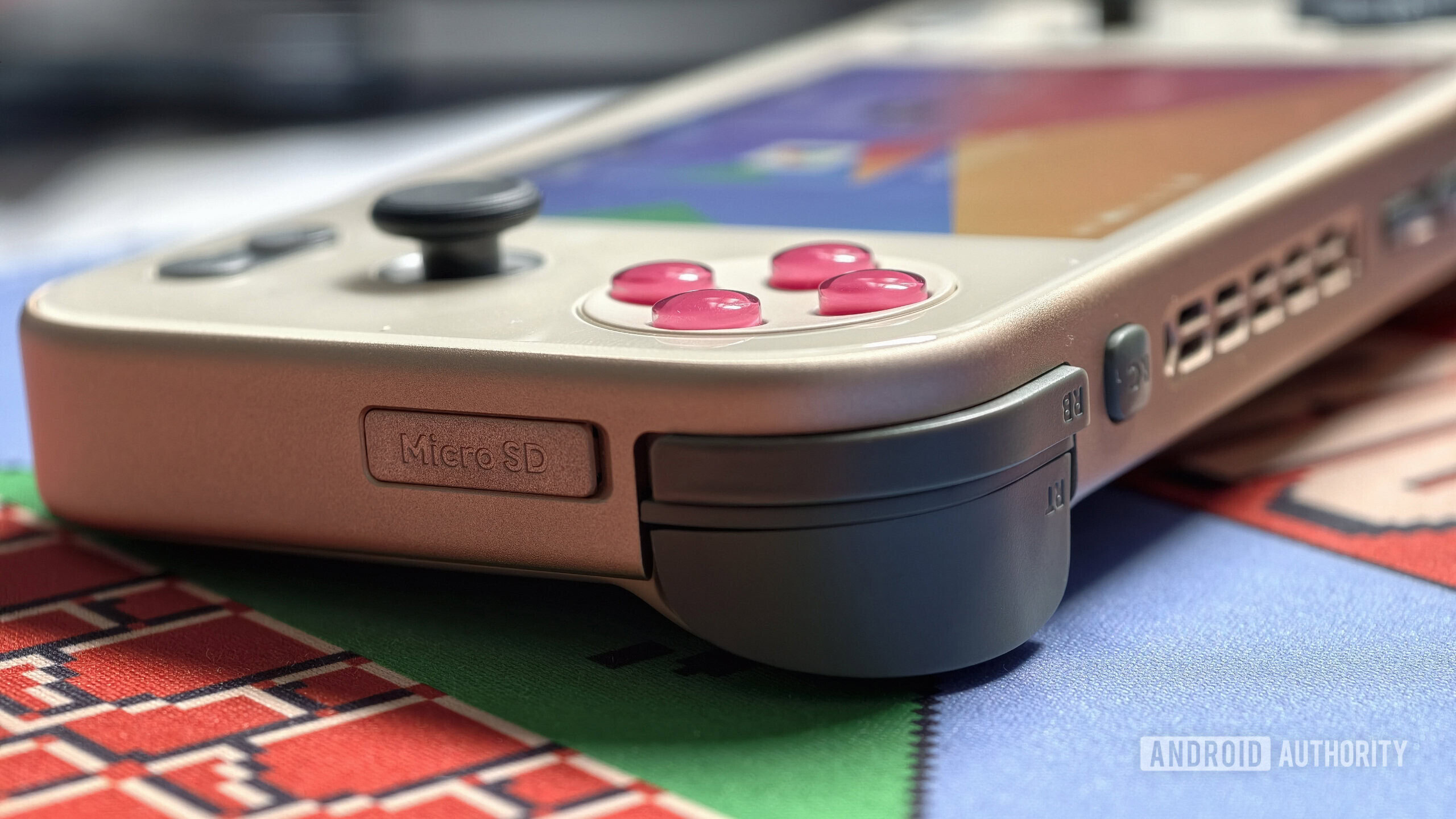 AYANEO Pocket S Mini showing microSD slot and shoulder keys AYANEO Pocket S Mini showing microSD slot and shoulder keys