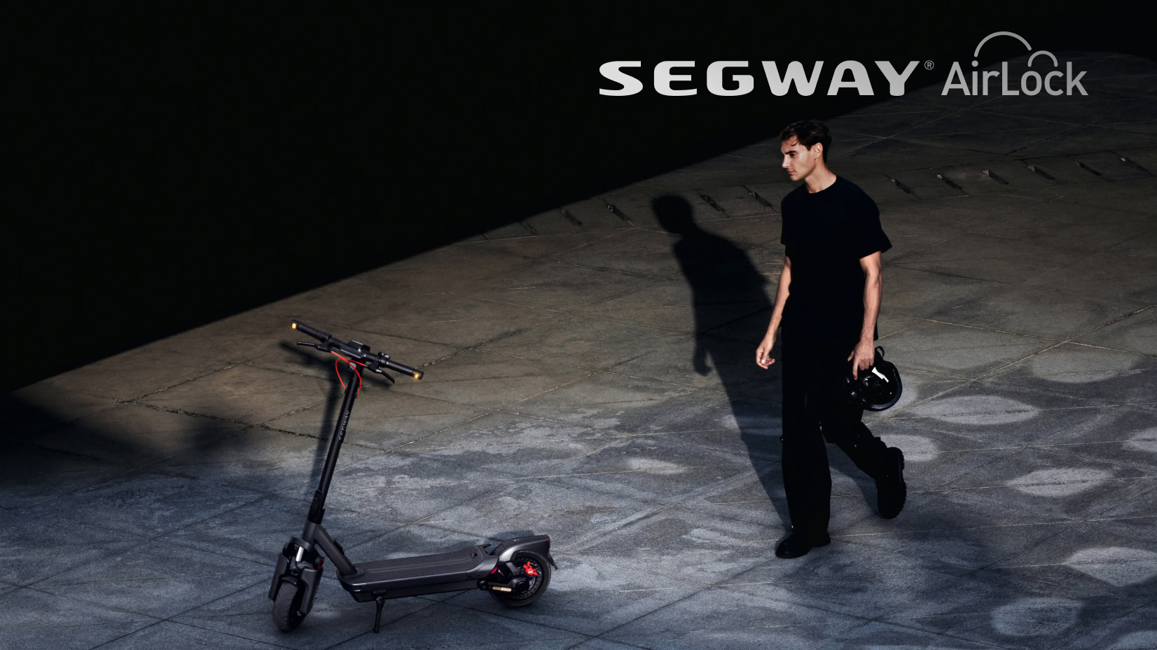 Person walking towards Segway Max G3 Electric Scooter