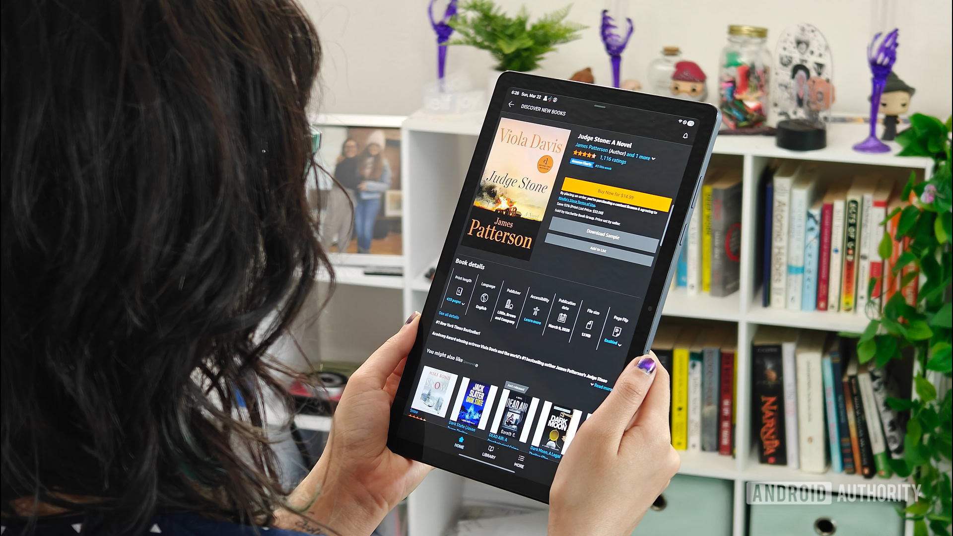 Samsung Galaxy Tab A15 Plus 5G review image showing the tablet in portrait mode with the Kindle app open