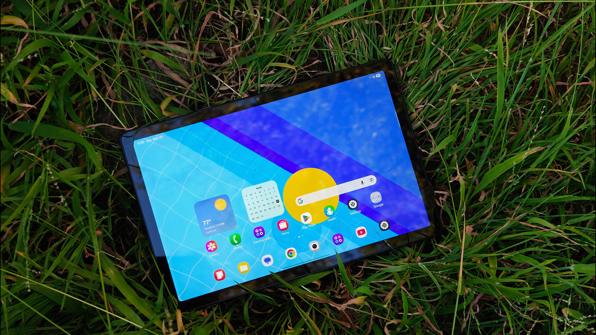 Samsung Galaxy Tab A15 Plus 5G review image showing the tablet's home screen in an outdoor setting