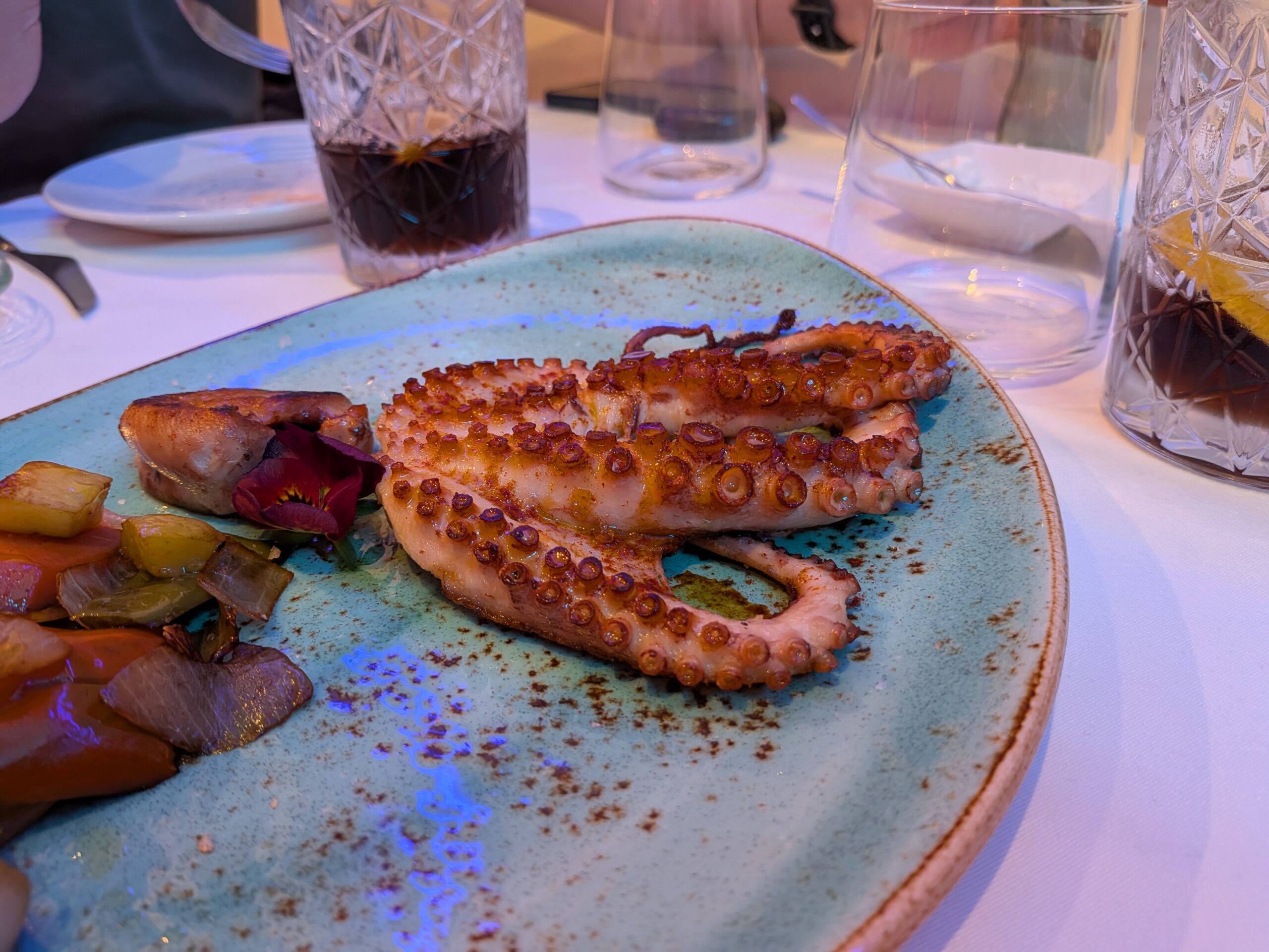 A photo of grilled octopus, captured with the Google Pixel 10a.