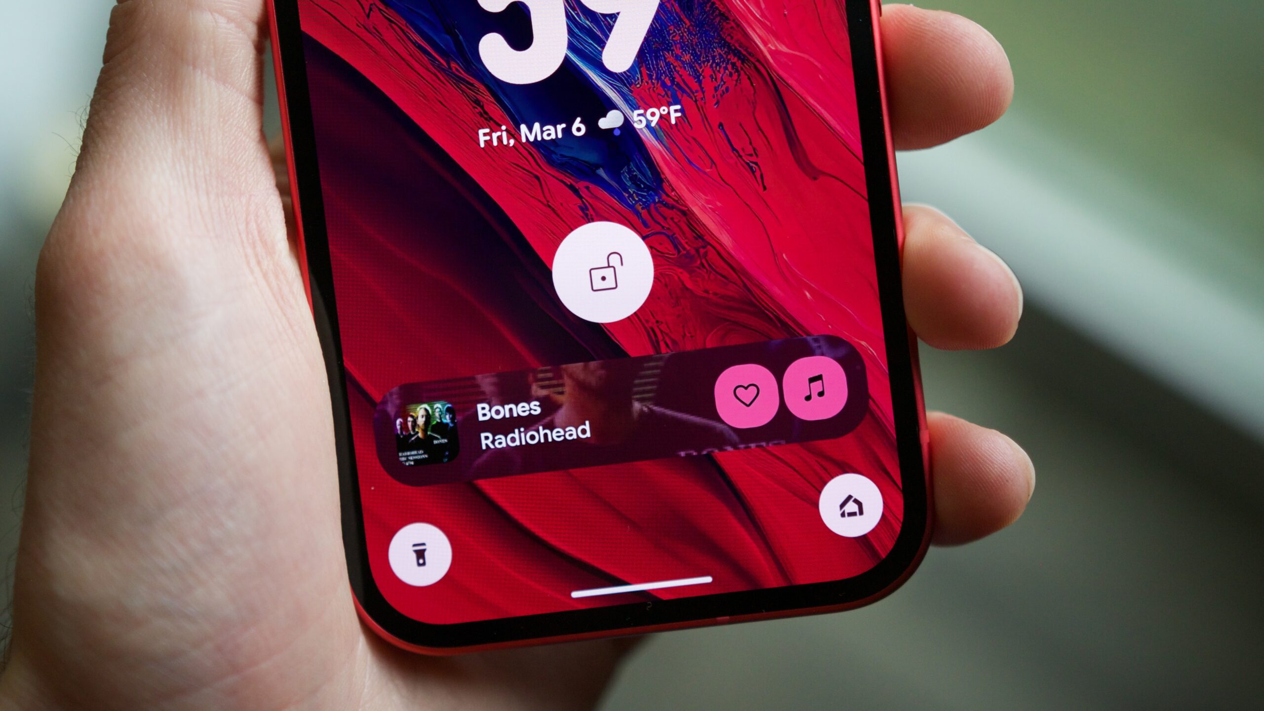 The new Now Playing UI on a Pixel phone's lock screen.
