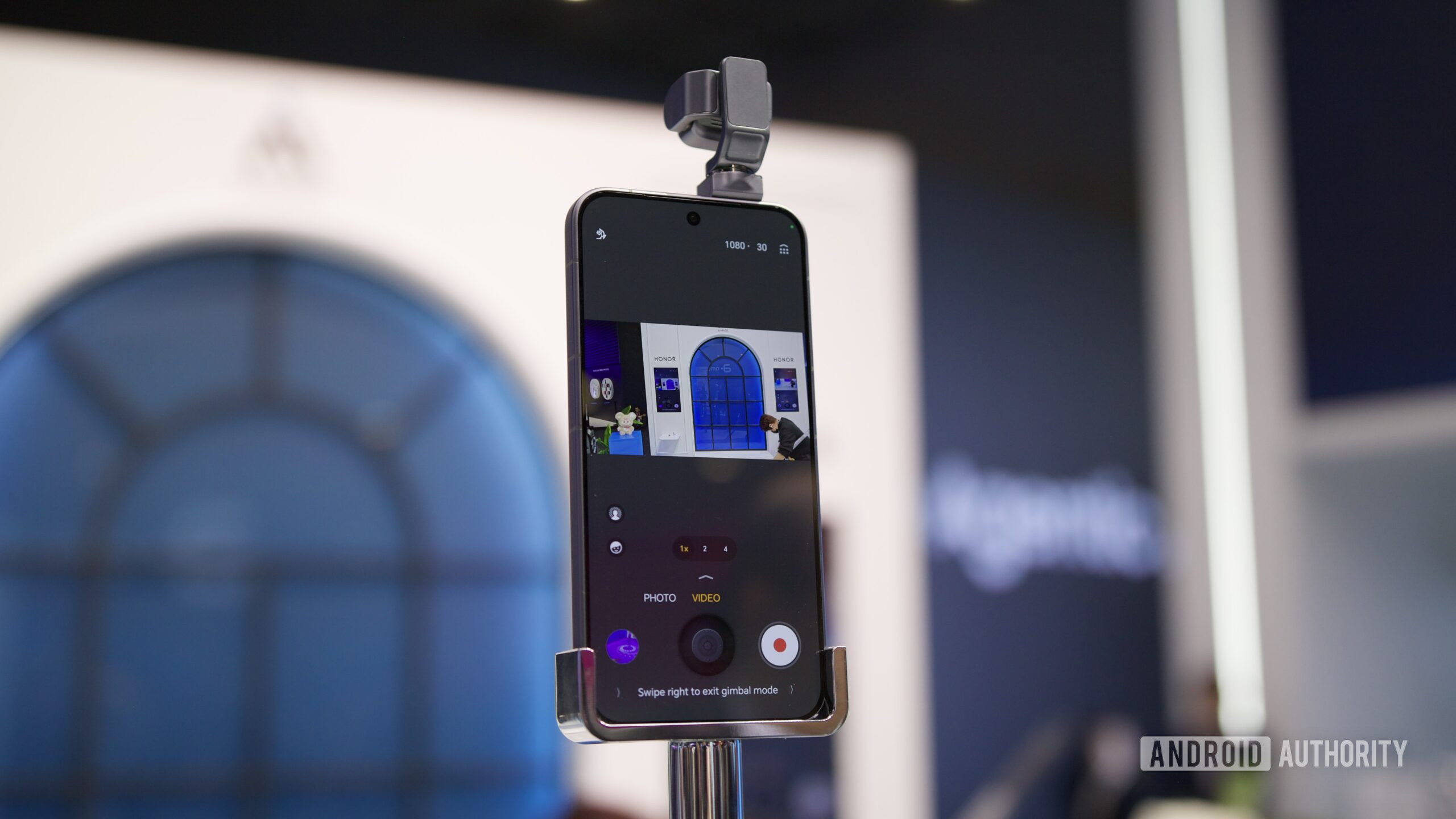 The HONOR Robot Phone with its camera activated, seen at MWC 2026.