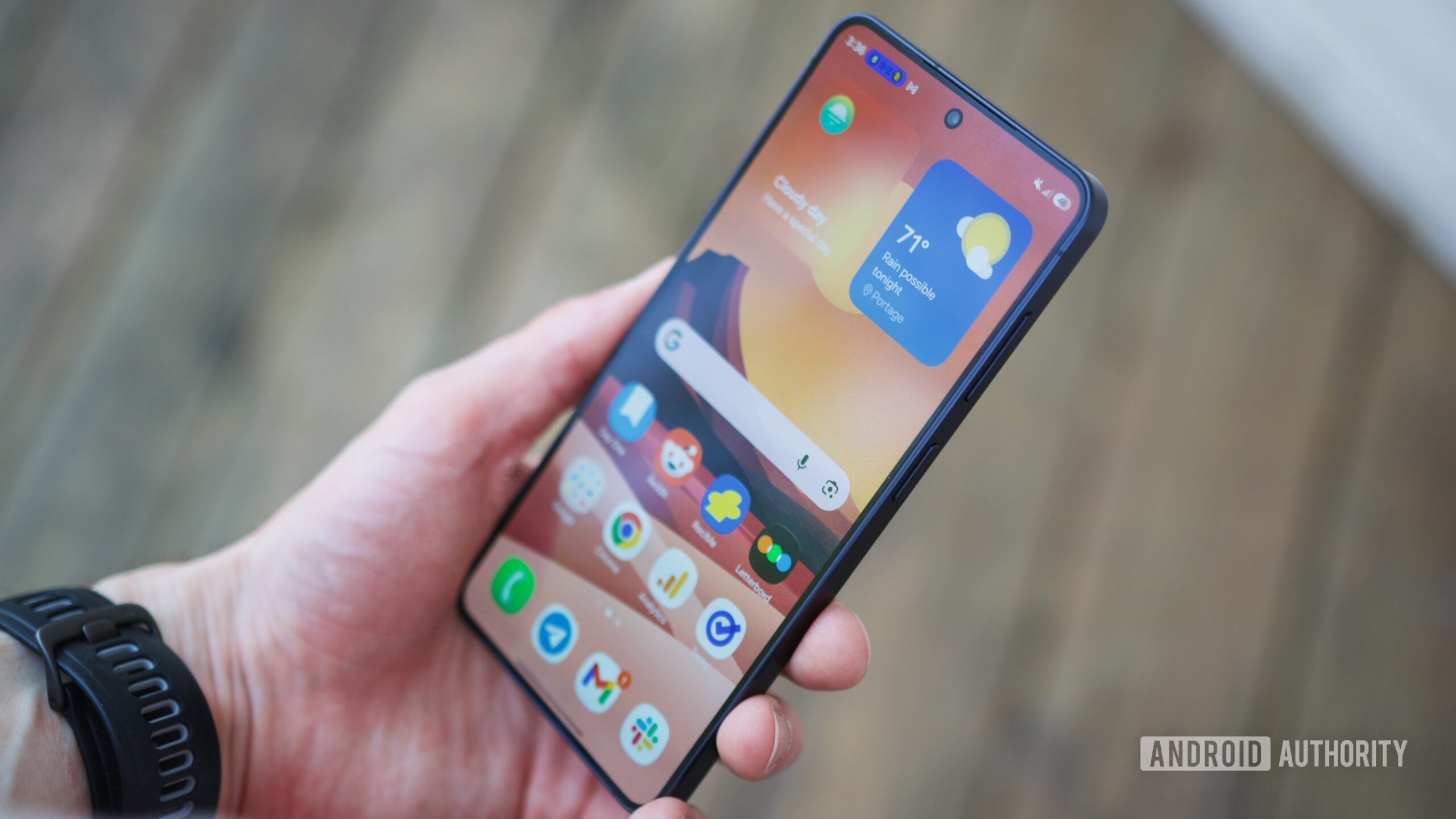 Samsung Galaxy S26 with its screen on, showing the home screen.