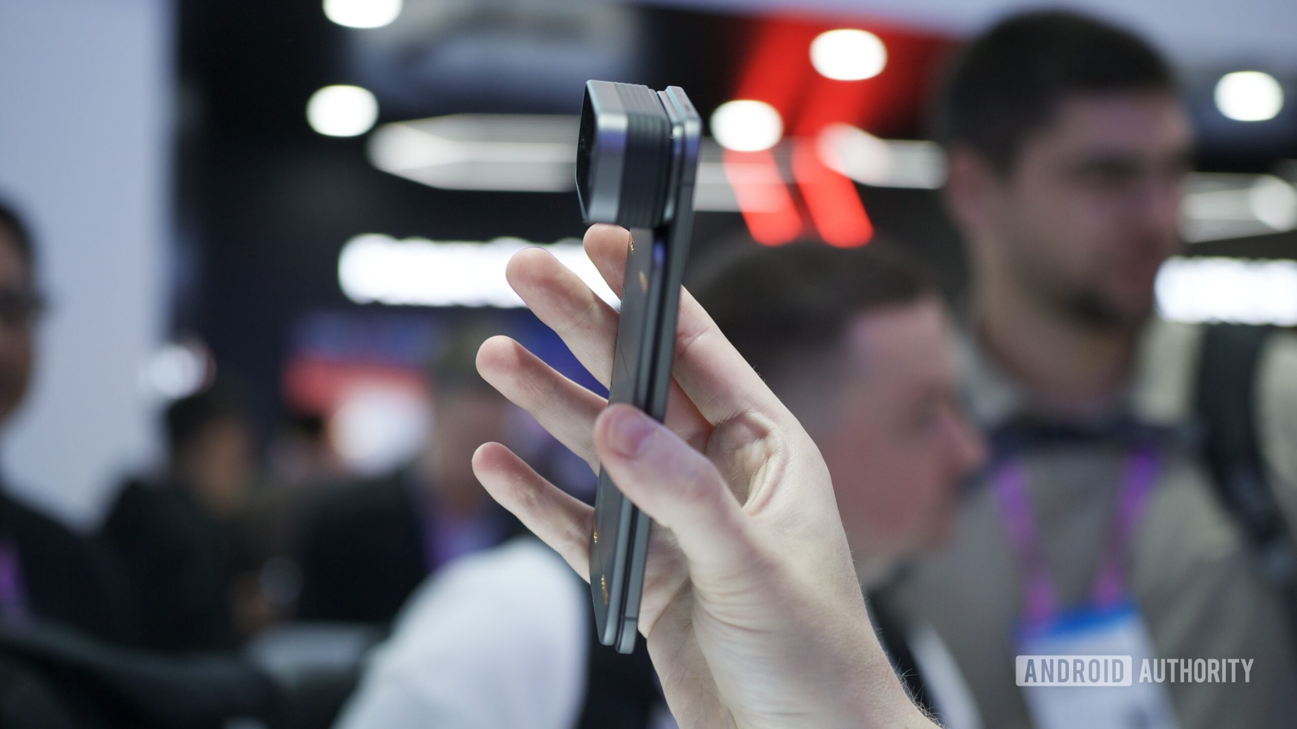 TECNO's MWC 2026 concept phone with a camera module attached.