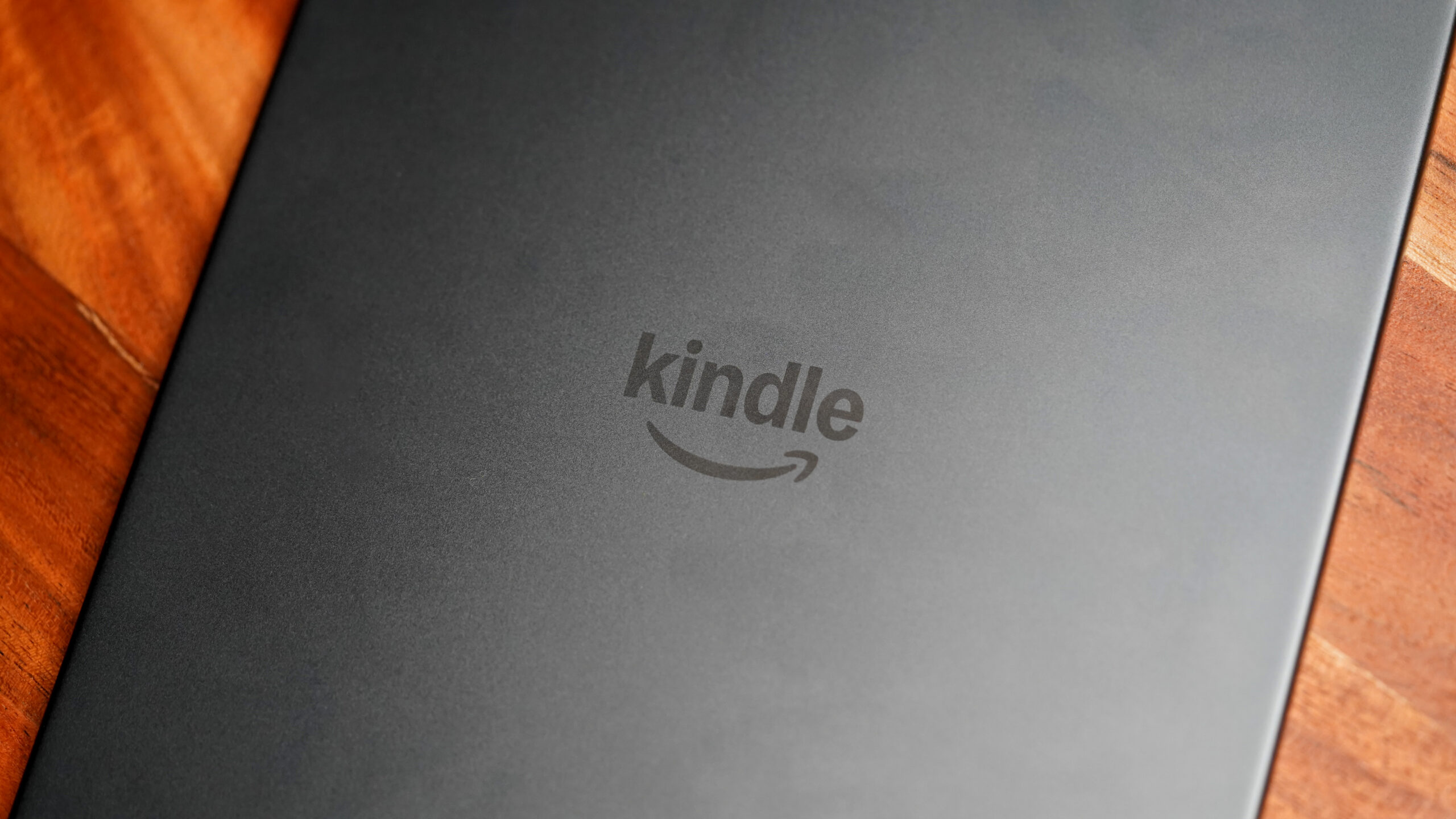 A Kindle face down model is Amazon's Kindle logo.