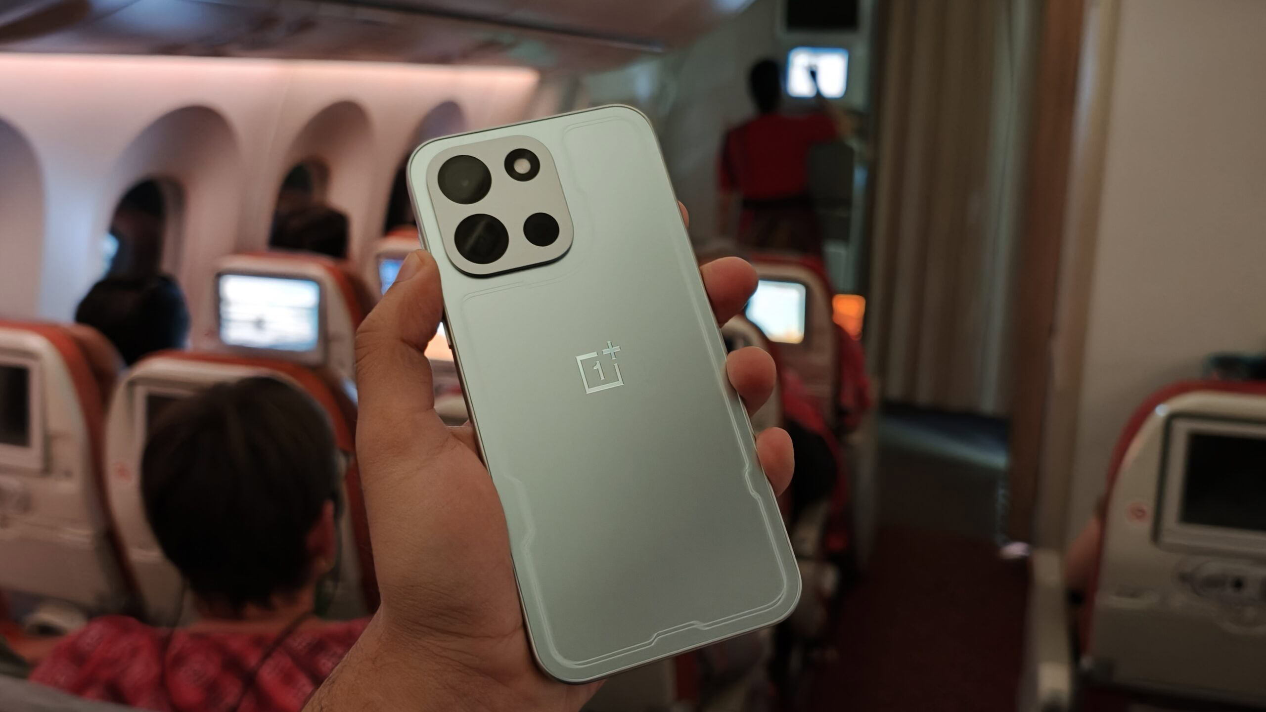 Someone holding the OnePlus Nord 6.