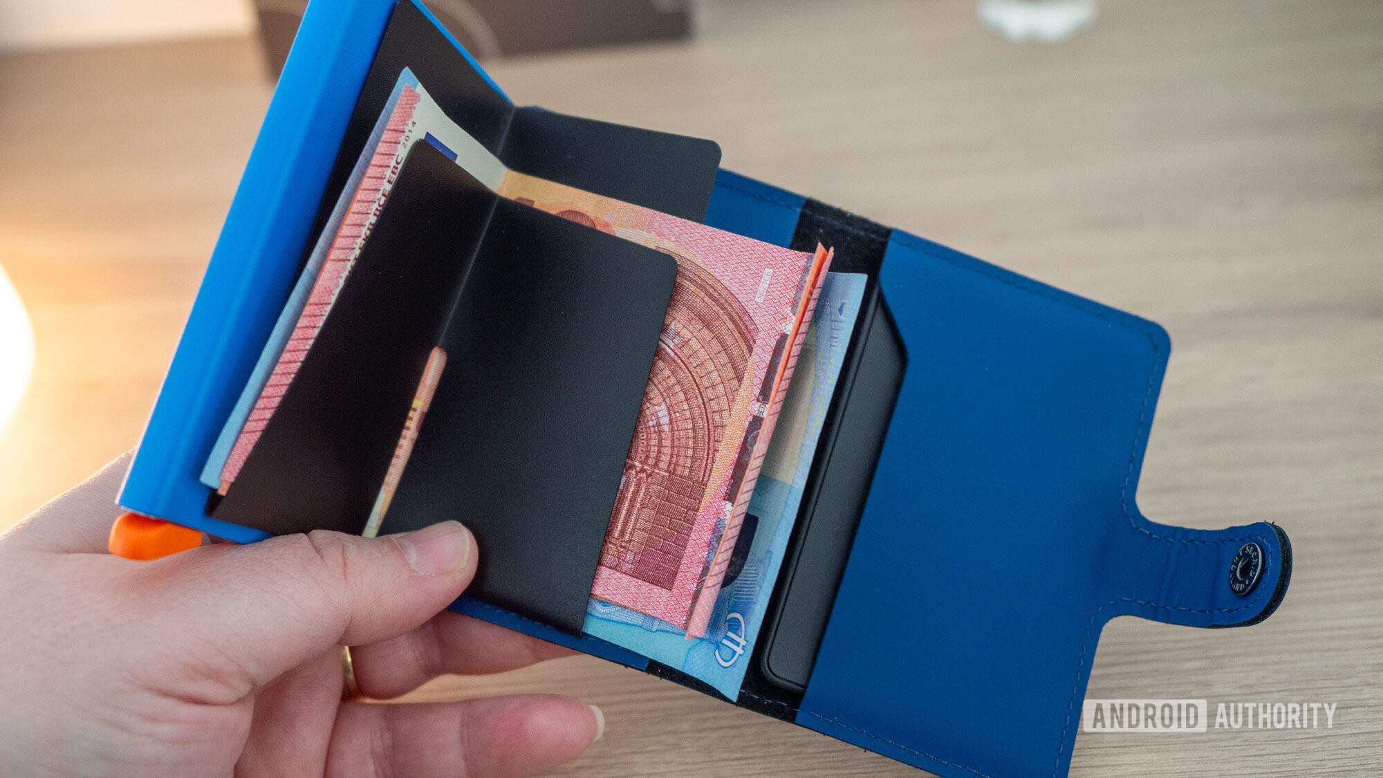 chipolo card google find hub bluetooth tracker secrid wallet open