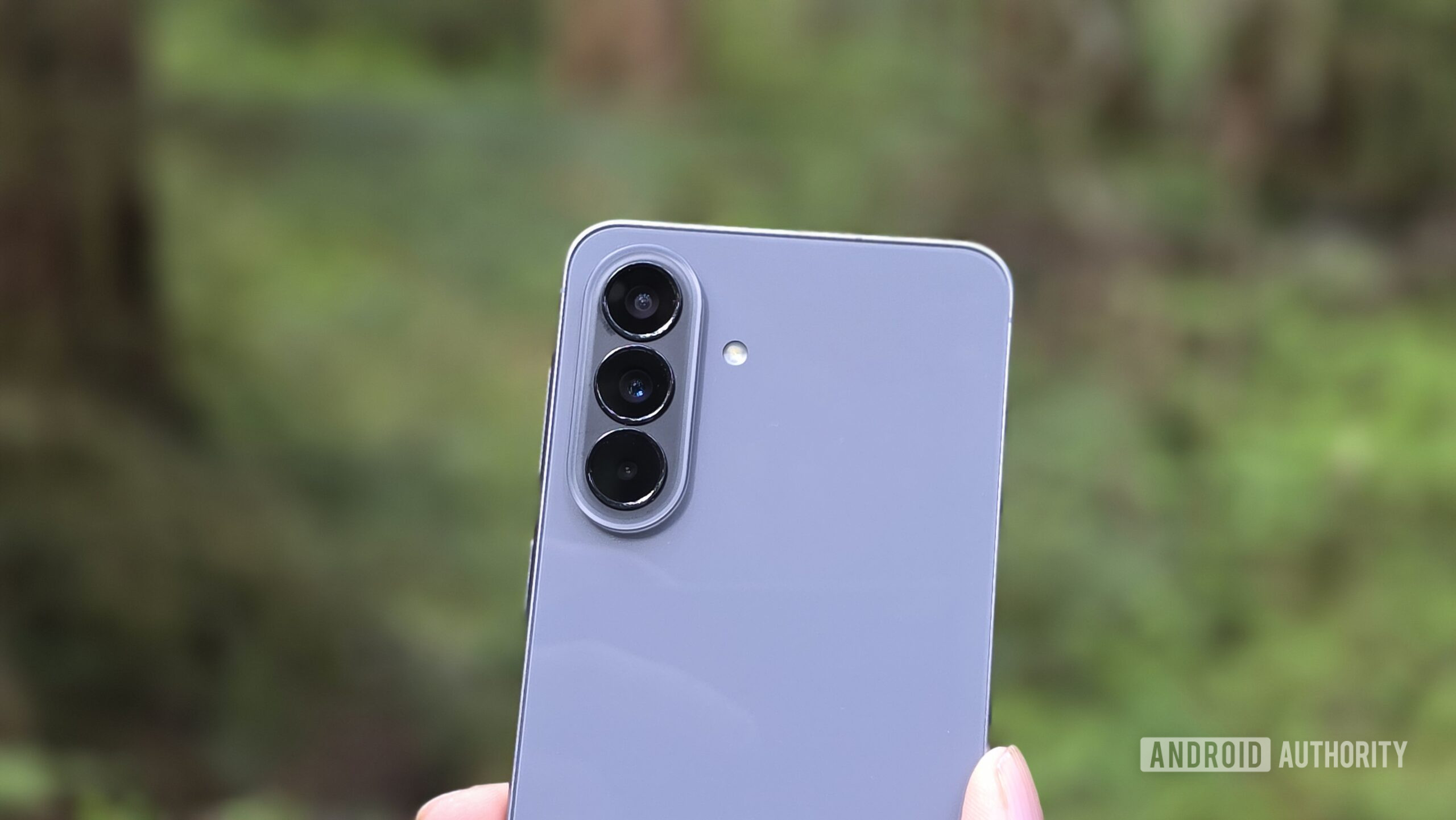 Samsung Galaxy A57 review image showing the phone's triple camera setup