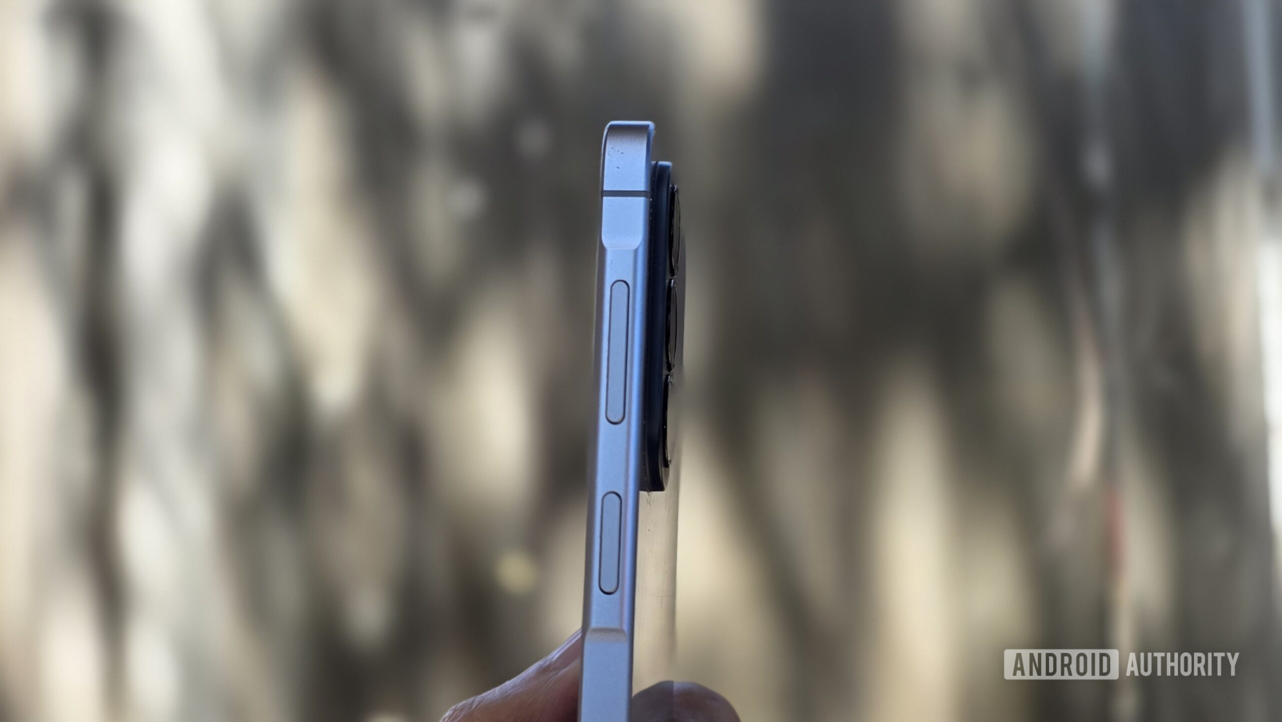 Samsung Galaxy A57 5G review image showing the phone's raised island that houses the power button and volume rocker