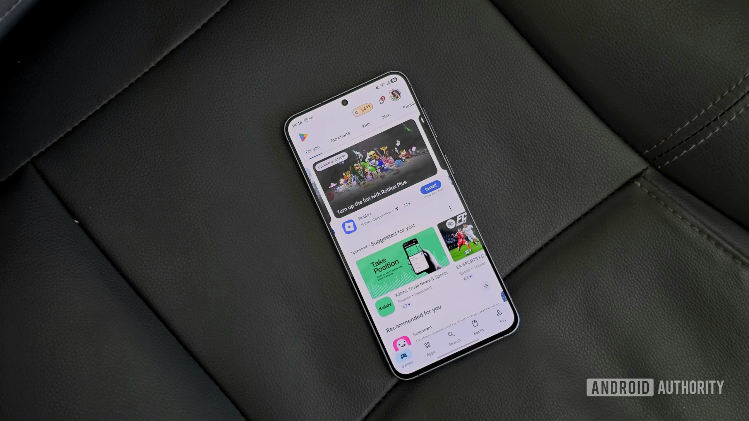 Samsung Galaxy A57 review image showing the phone placed on a grey surface