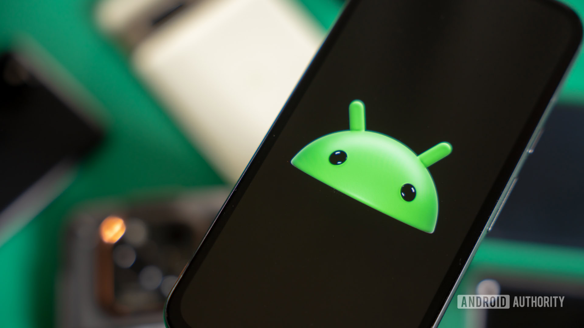 Android robot on phone stock photo 2