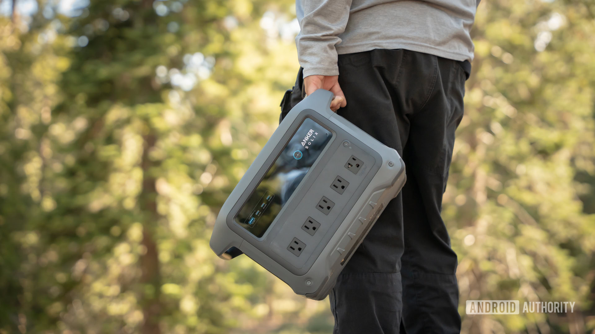 Edgar holding Anker SOLIX C1000 Gen 2 in forest 1