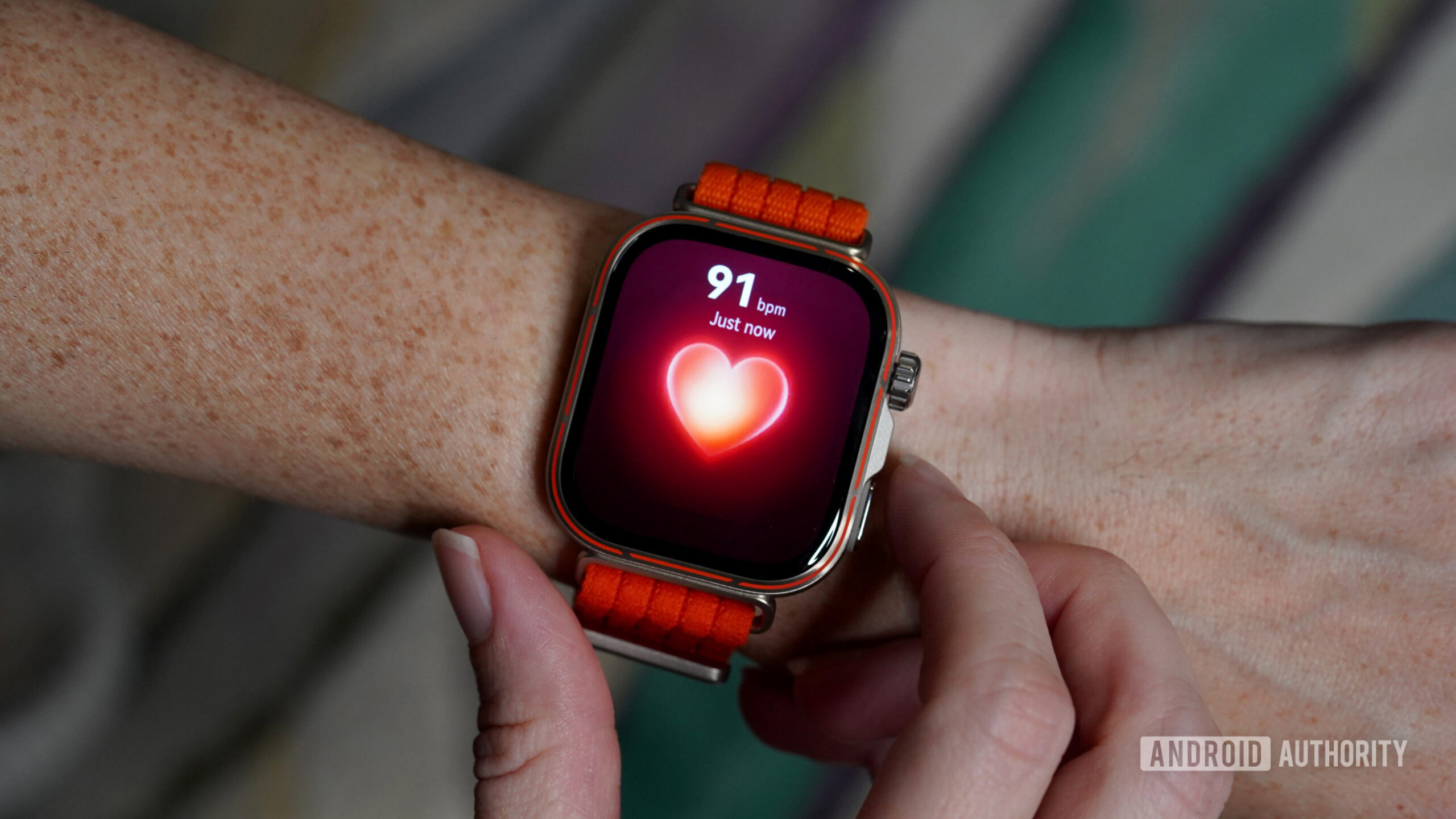 A user measures their heart rate on a HUAWEI Watch Fit 5 Pro.