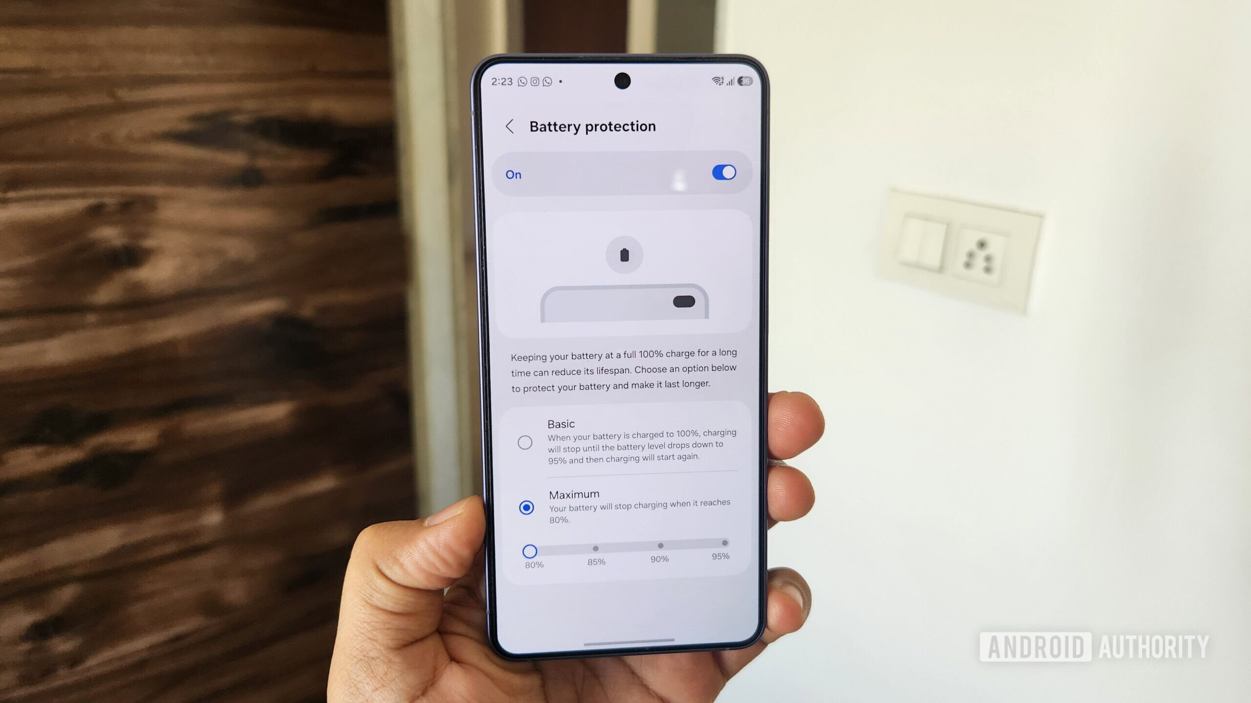 S26 in hand showing battery protection menu