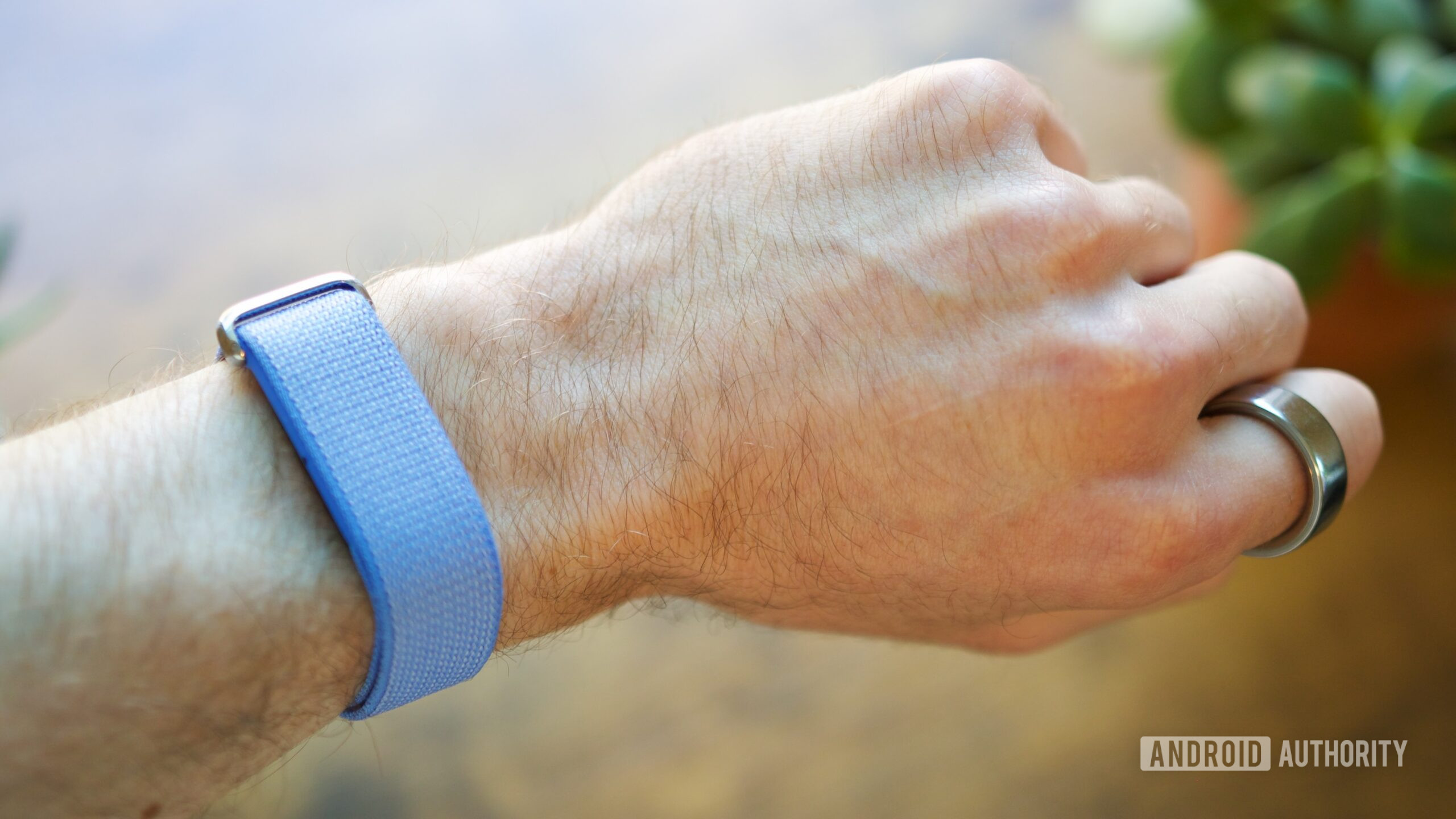 google fitbit air and oura ring 4 Someone wearing the Fitbit Air and Oura Ring 4.