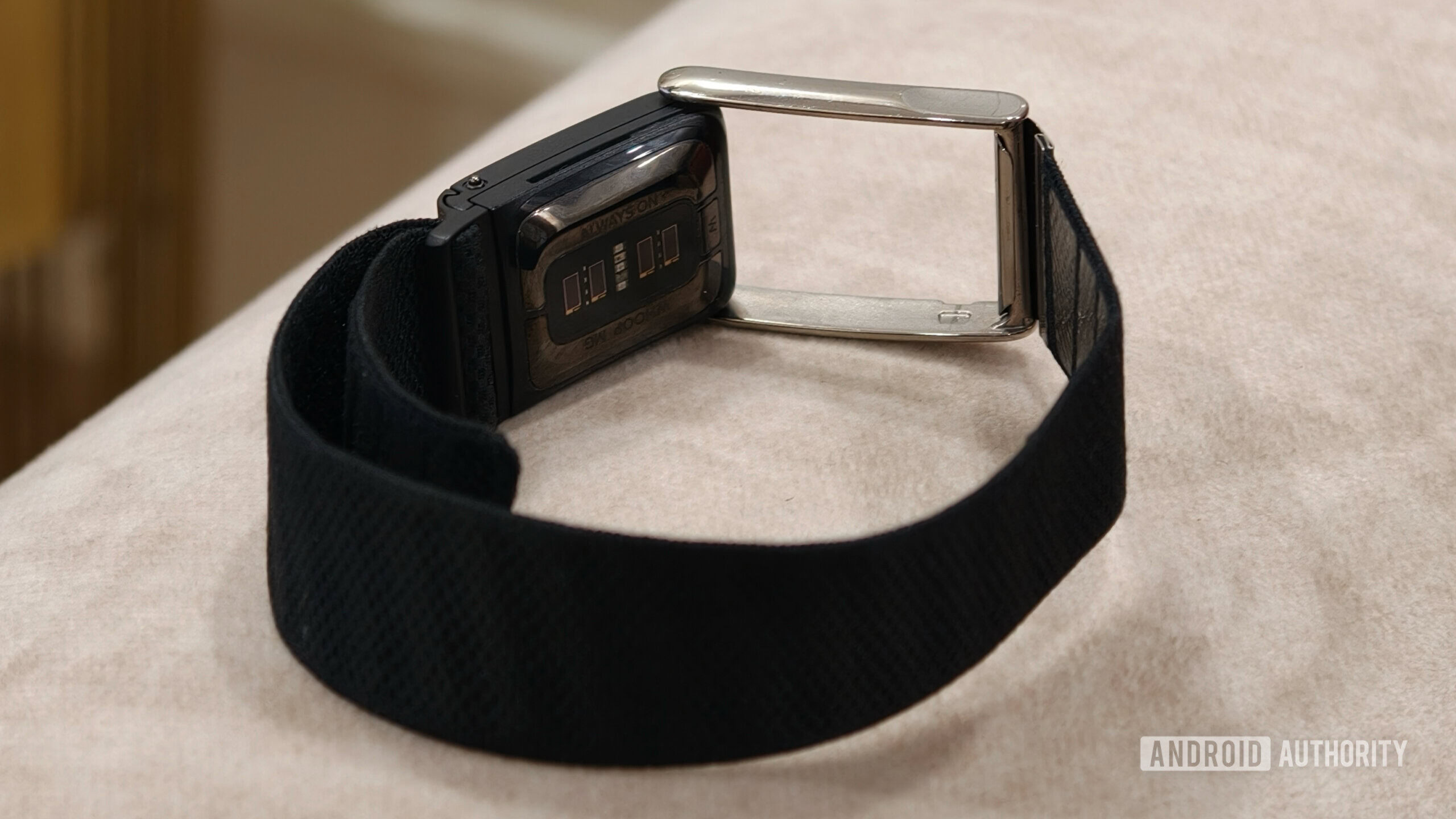 Image showing WHOOP's sensor and band.