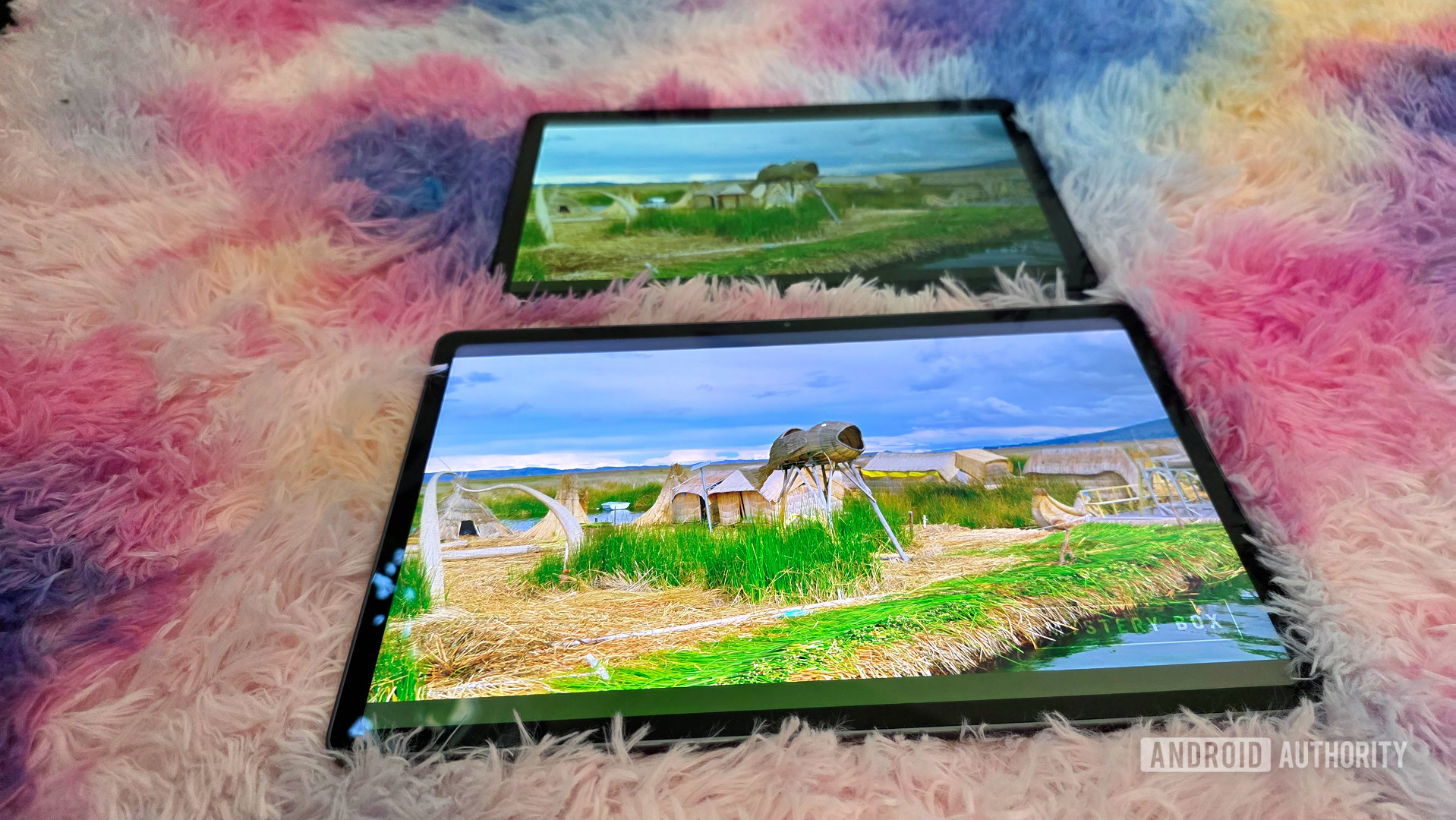 Lenovo Idea Tab review image showing its display compared to the Galaxy Tab A11 plus from an angle