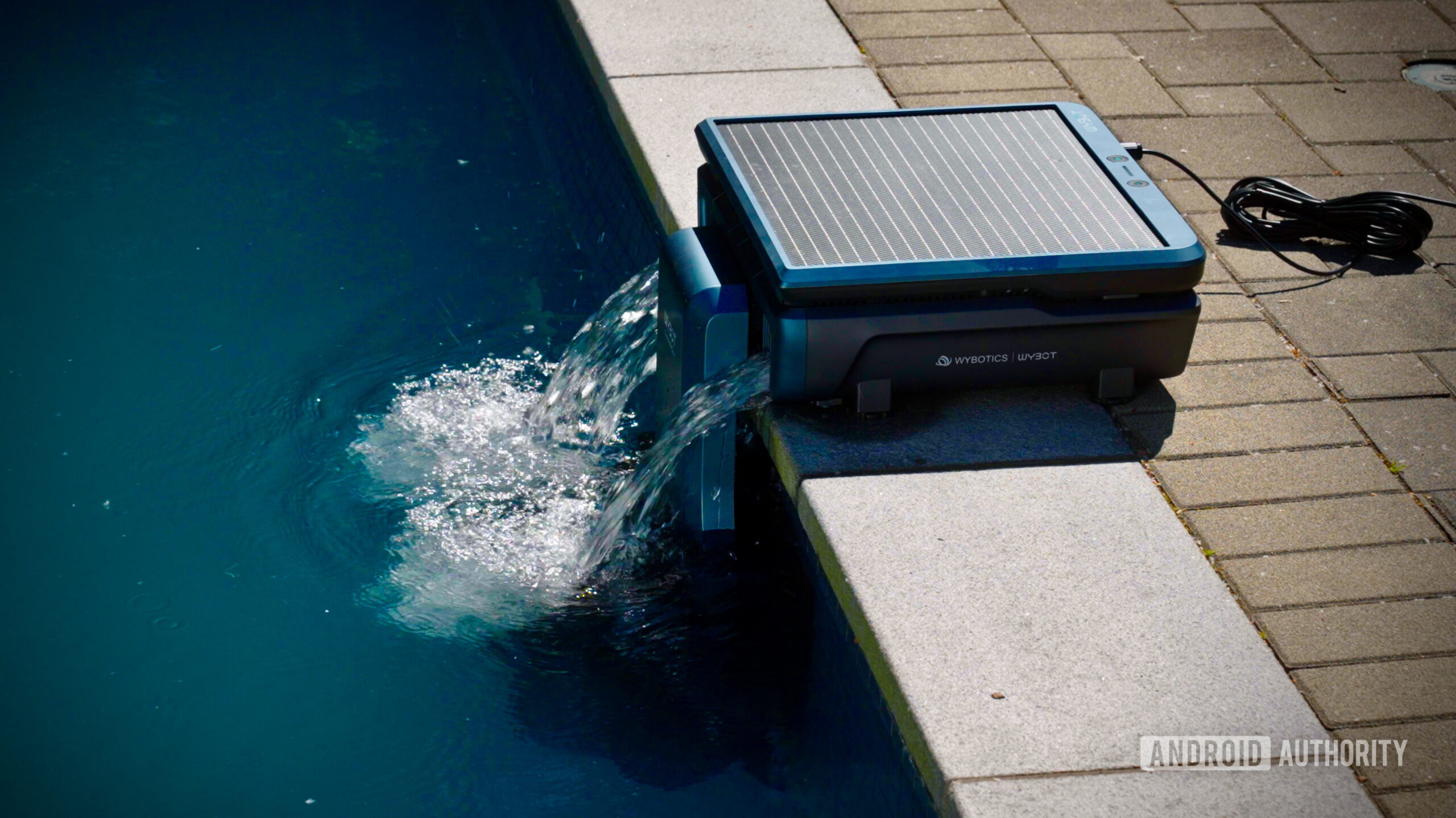 WYBOT S3 Robot Pool Cleaner 2 (1) WYBOT S3 solar-powered charging station returning filtered water to the pool
