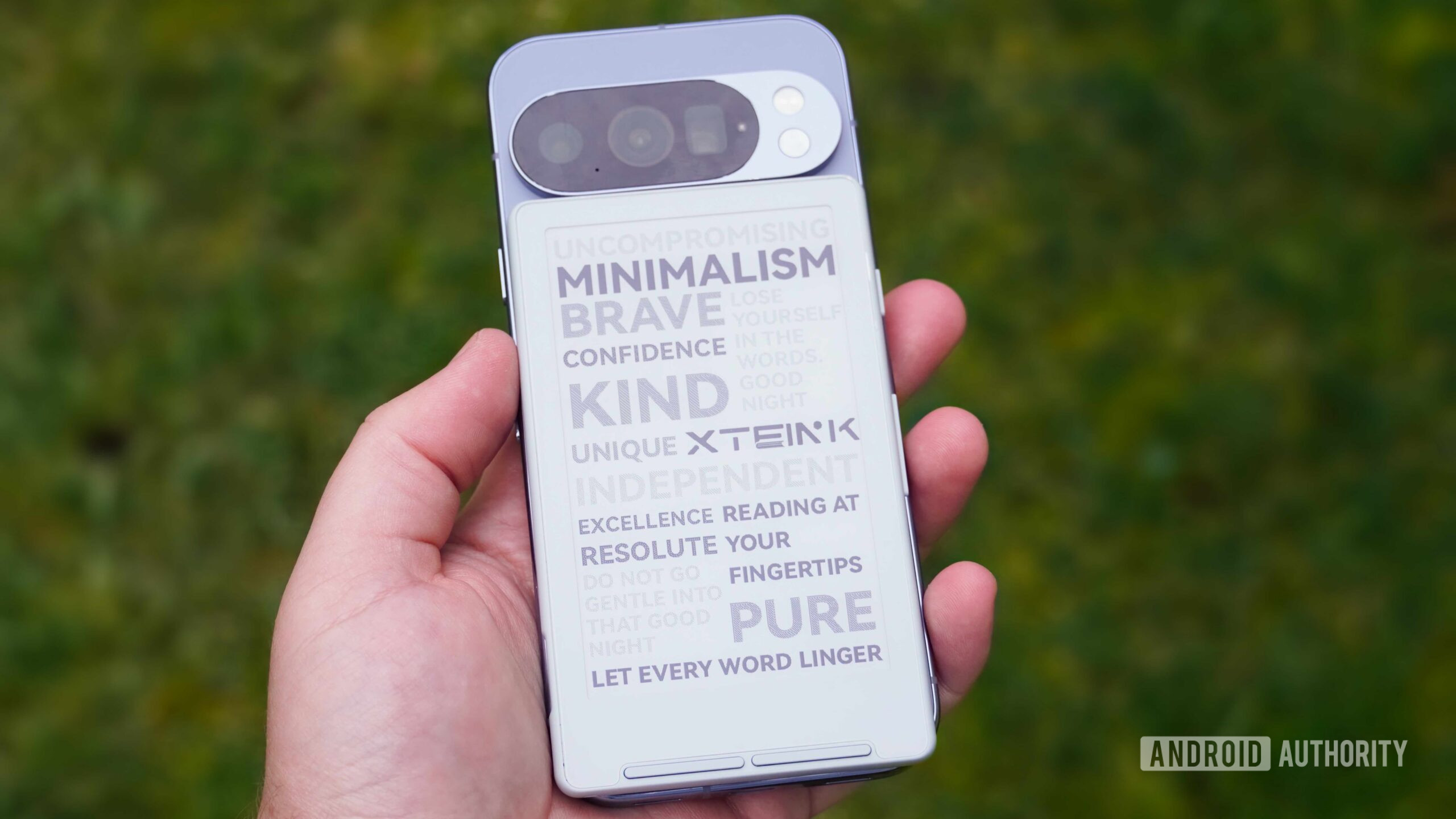 The Xteink X4 e-reader on the back of a Pixel 10 Pro using MagSafe.