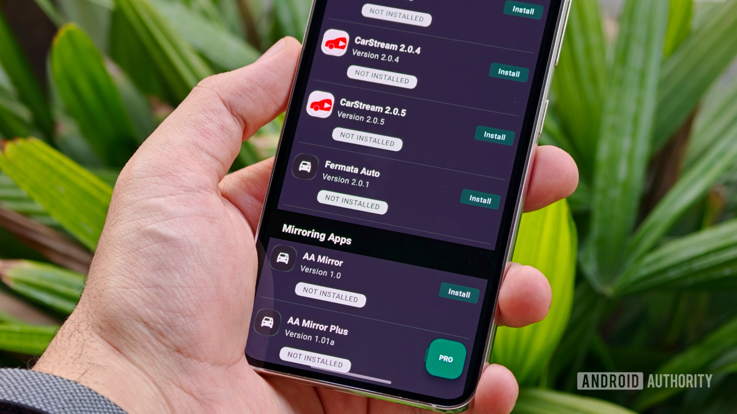 Third-party Android Auto downloader menu showcasing CarStream version options and mirroring applications
