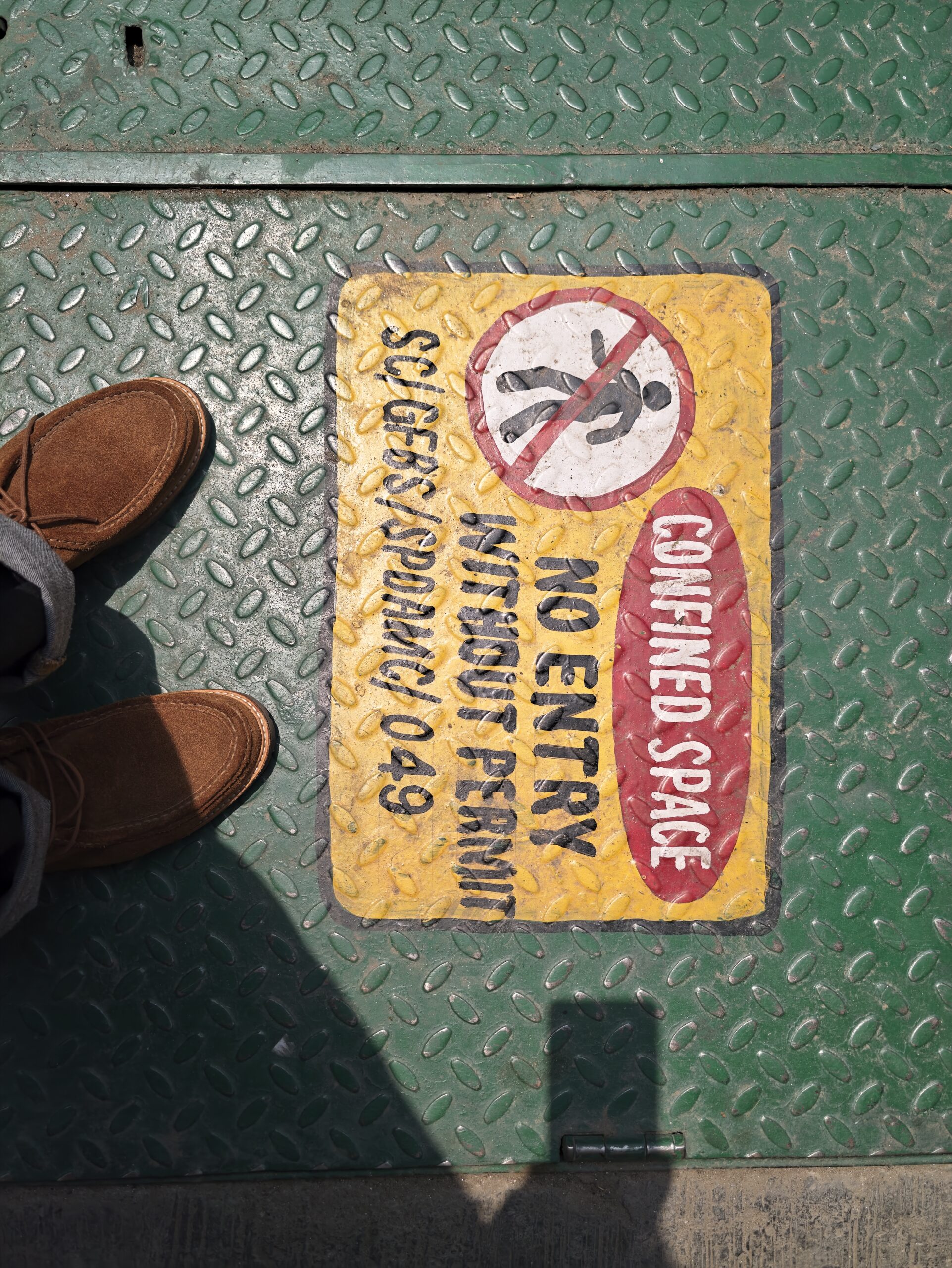 An image of a manhole entrance shot on the Vivo X300 Ultra at 35mm